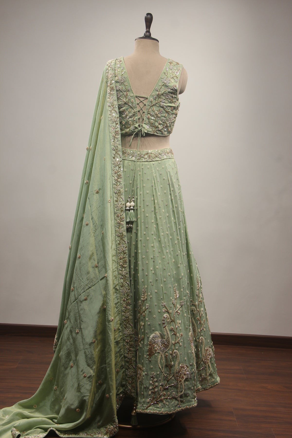 Pista Green Tissue Lehenga with Cut Dana & Bead Handwork Crop Top