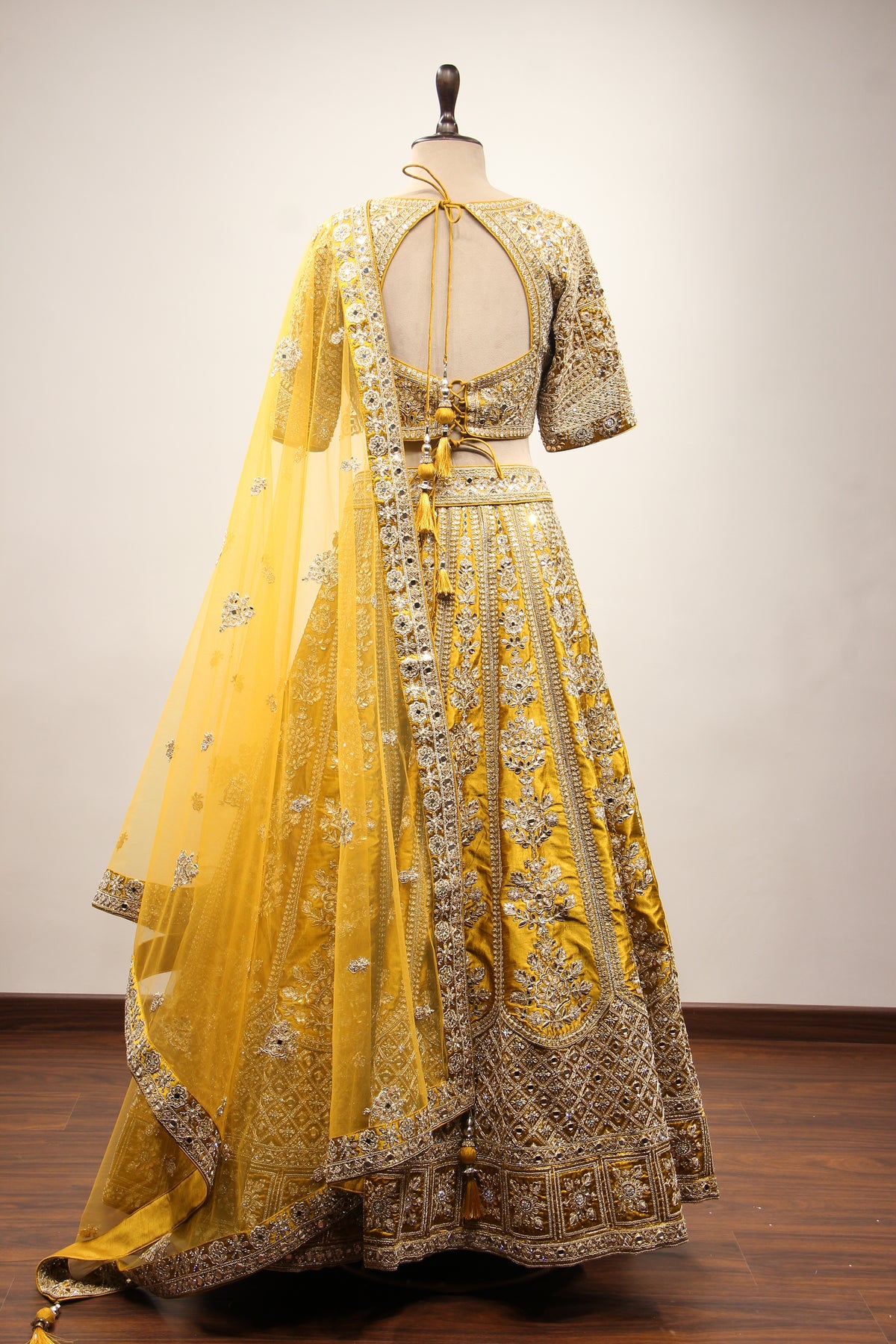 Mustard Silk Lehenga with Zari & Zardozi Handwork Crop Top – back view