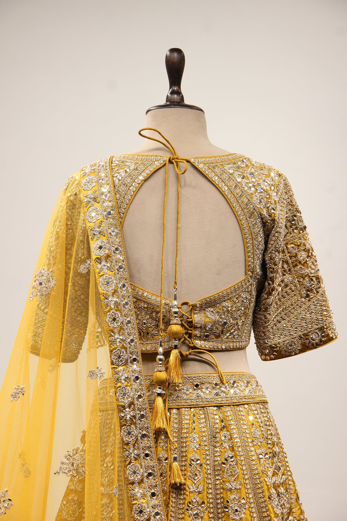 Mustard Silk Lehenga with Zari & Zardozi Handwork Crop Top – back close-up