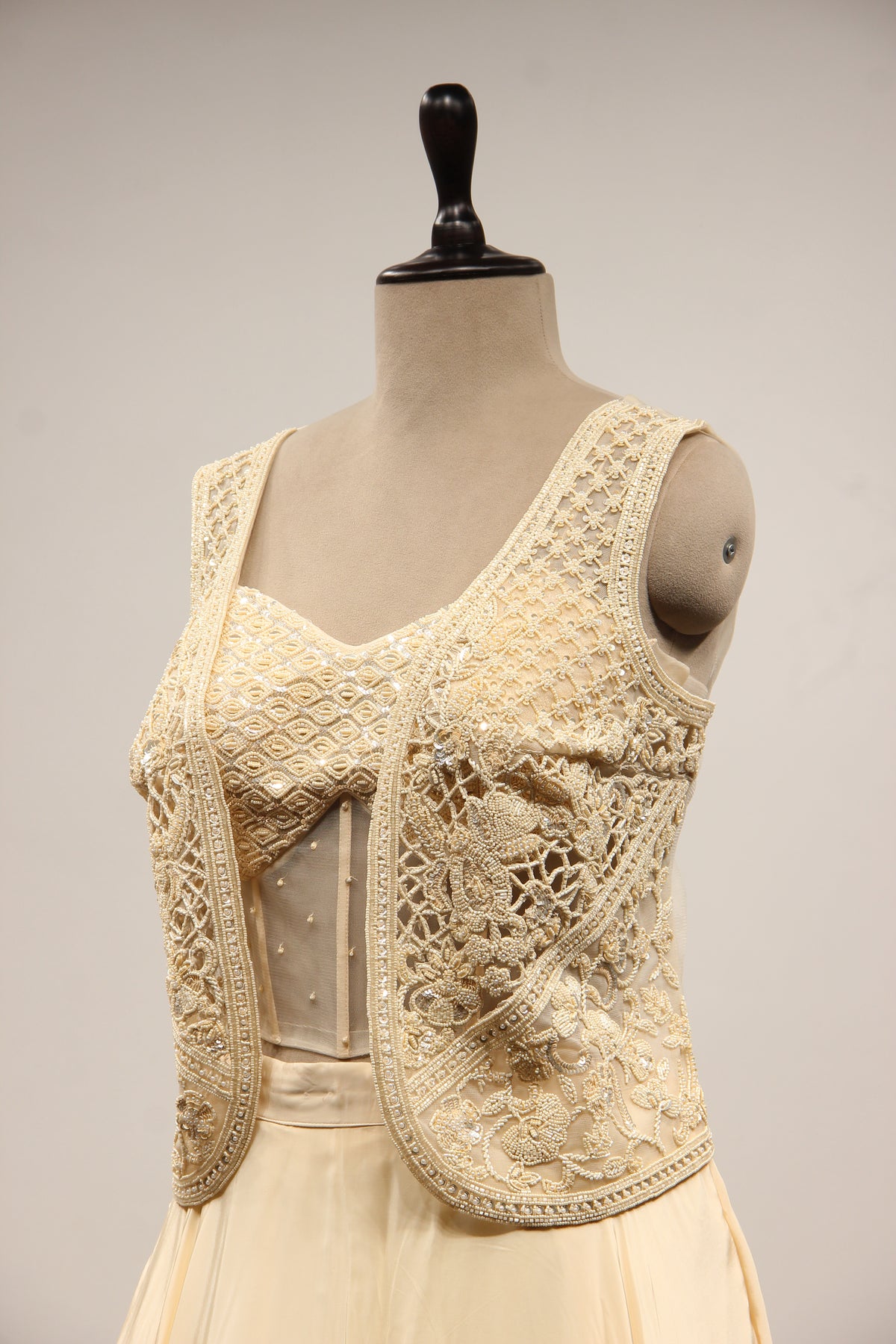 Cream Crepe Lehenga with Bead & Sequin Handwork Corset Jacket