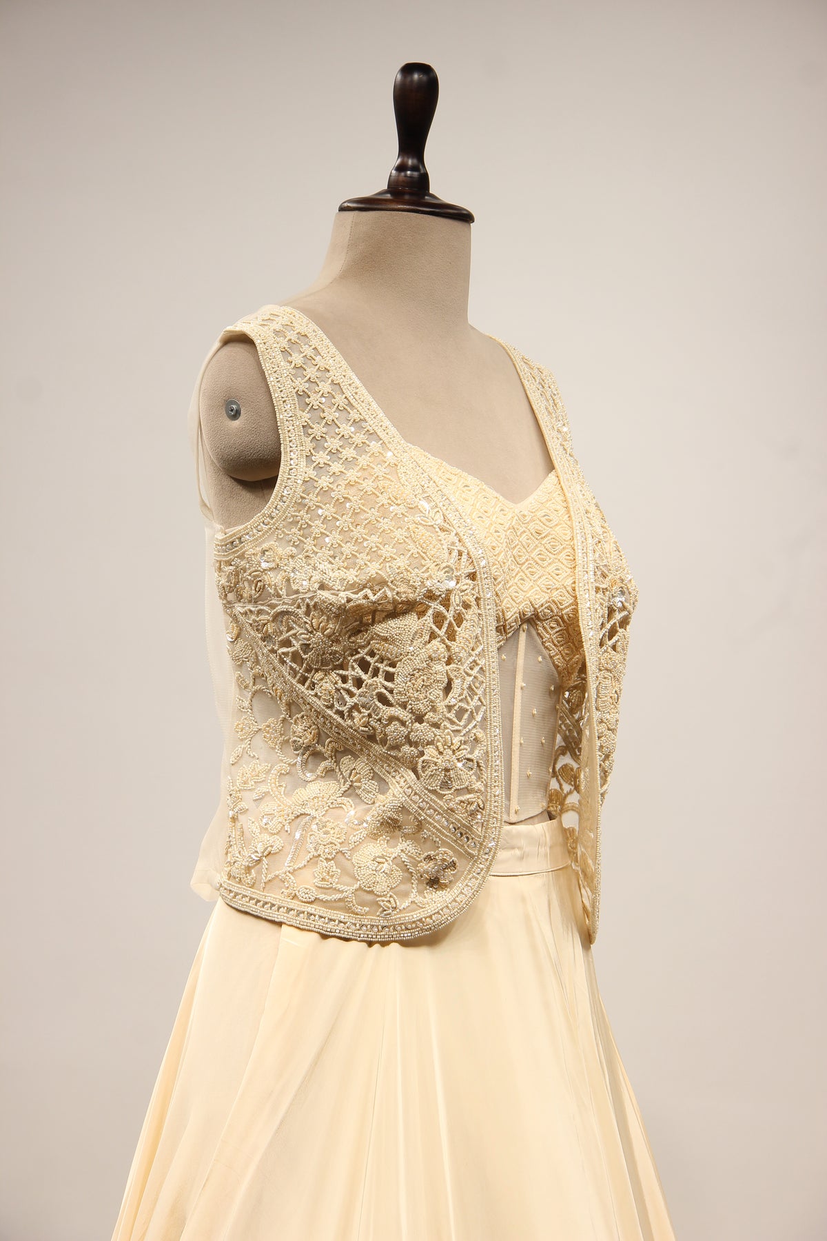 Cream Crepe Lehenga with Bead & Sequin Handwork Corset Jacket