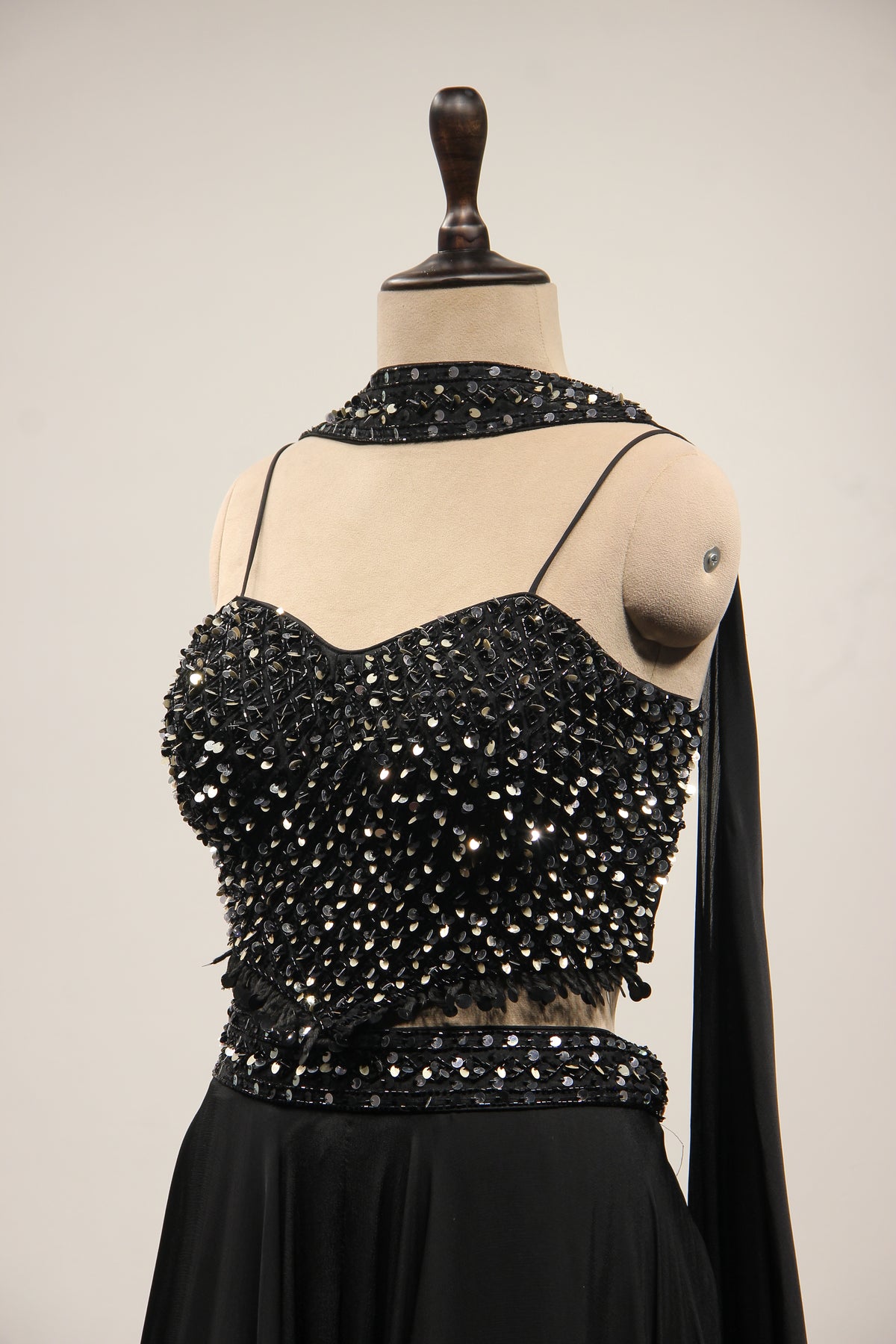 Black Crepe Lehenga with Sequin & Cut Dana Handwork Corset Blouse