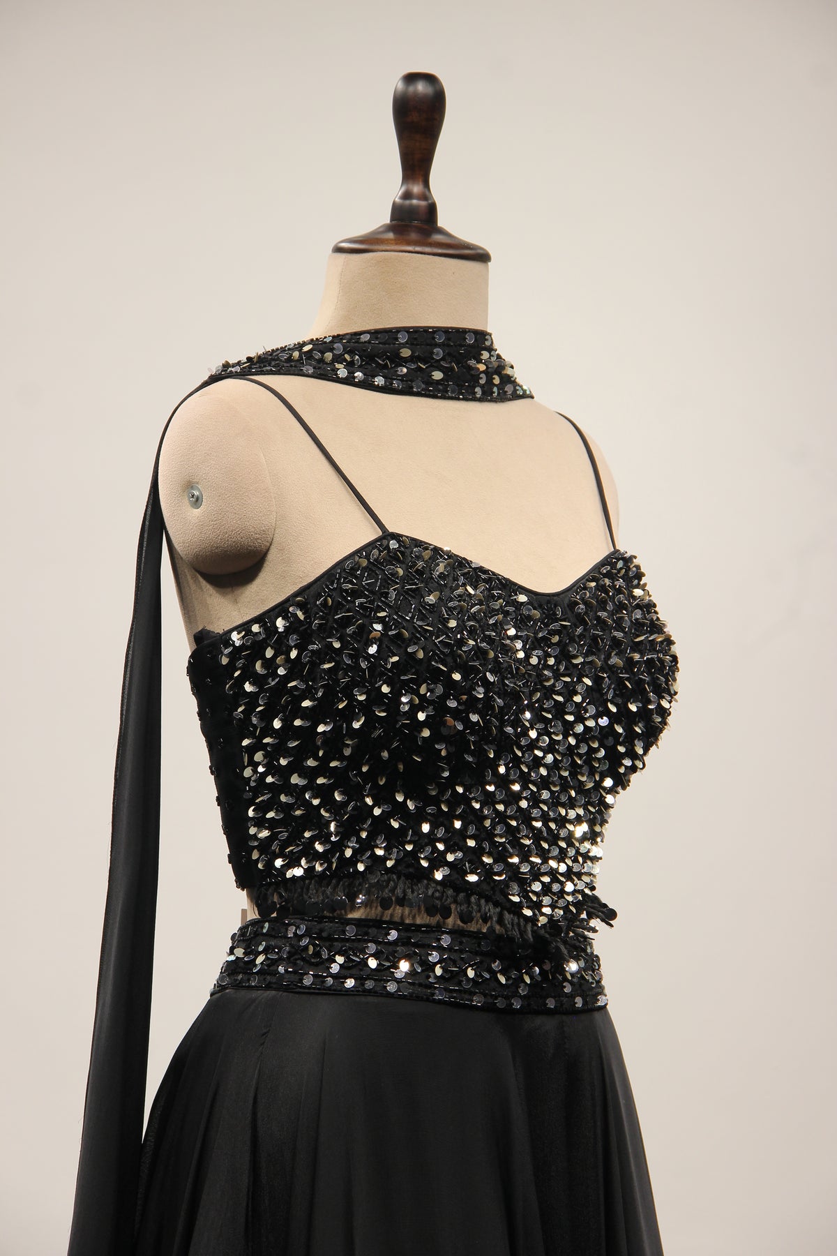 Black Crepe Lehenga with Sequin & Cut Dana Handwork Corset Blouse