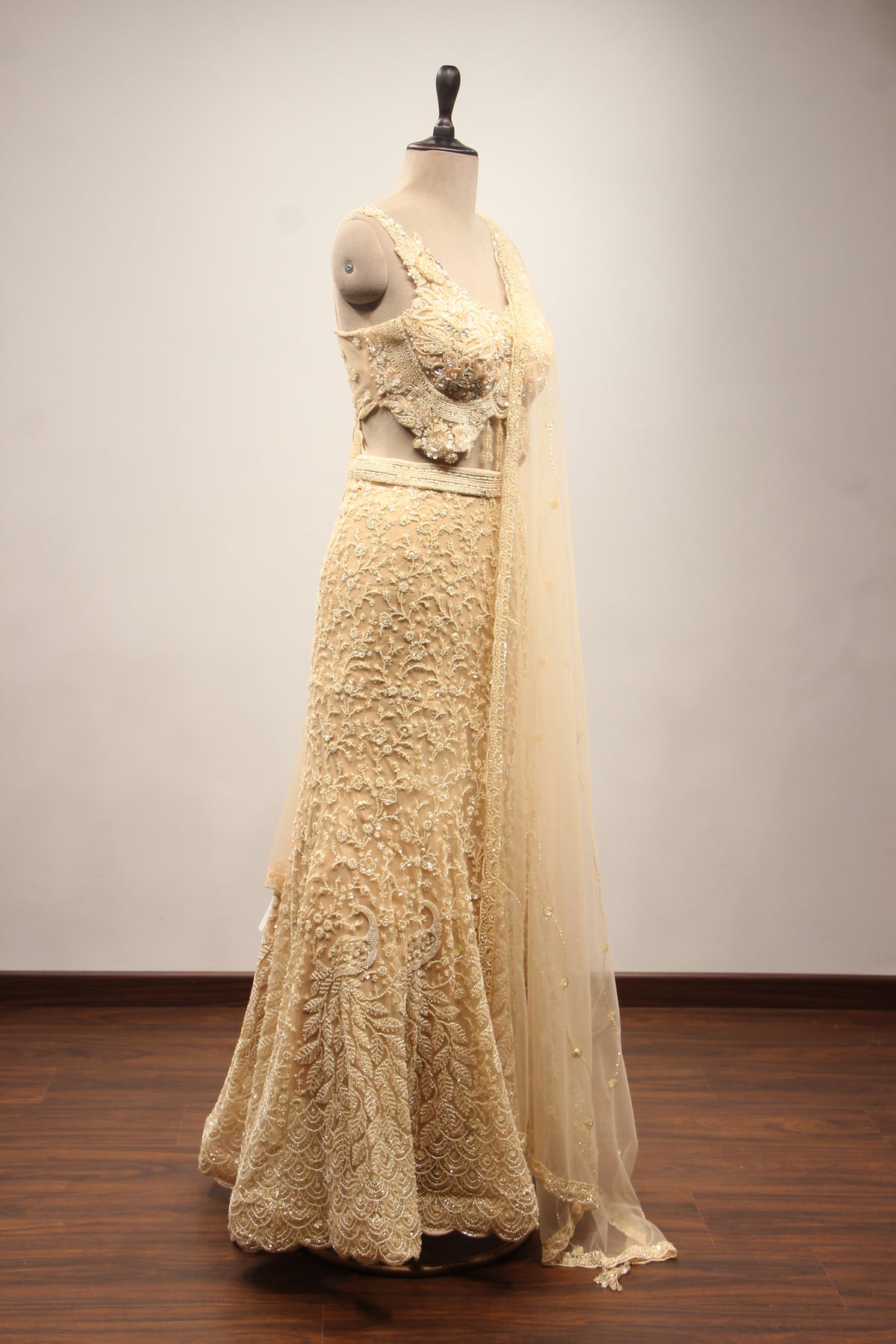 Net Mermaid Lehenga with Sequin & Cut Dana Handwork and Floral Bodice in Gold – other side view