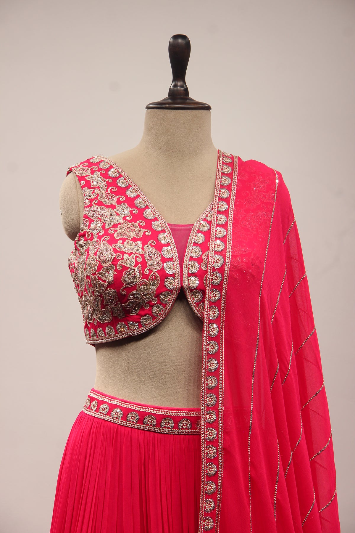 Orange Georgette Lehenga with Resham & Zari Handwork Crop Top in Pink – front close-up