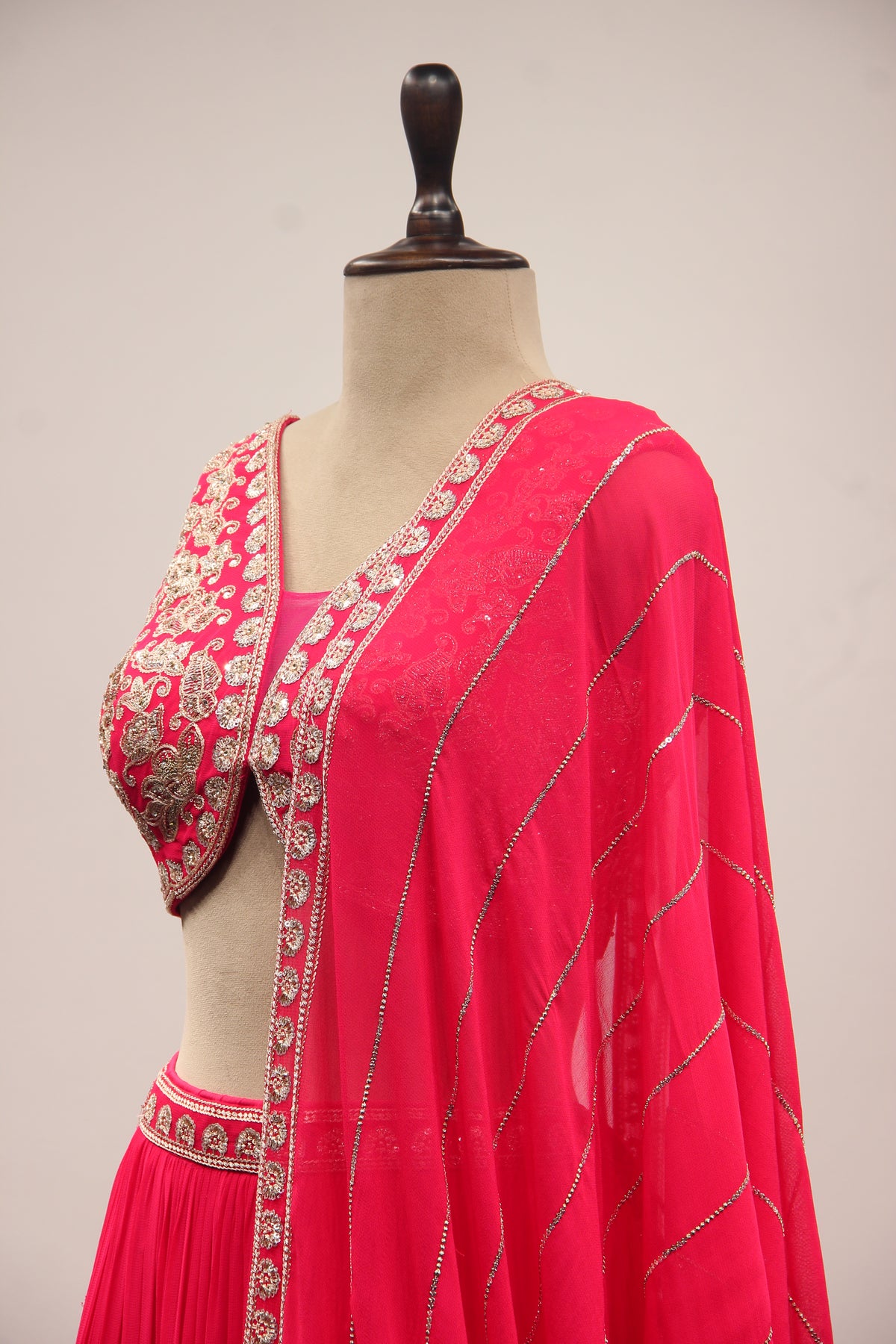 Orange Georgette Lehenga with Resham & Zari Handwork Crop Top in Pink – side close-up