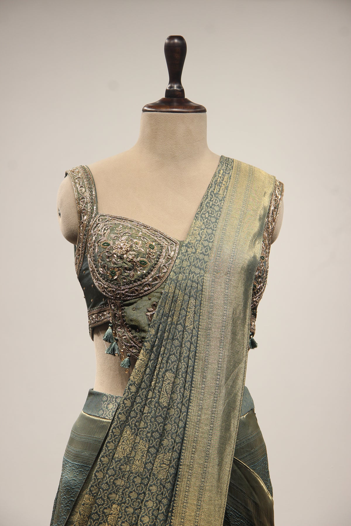 Banarasi Brocade Drape Saree with Zardozi & Cut Dana Handwork Corset in Green – front close-up