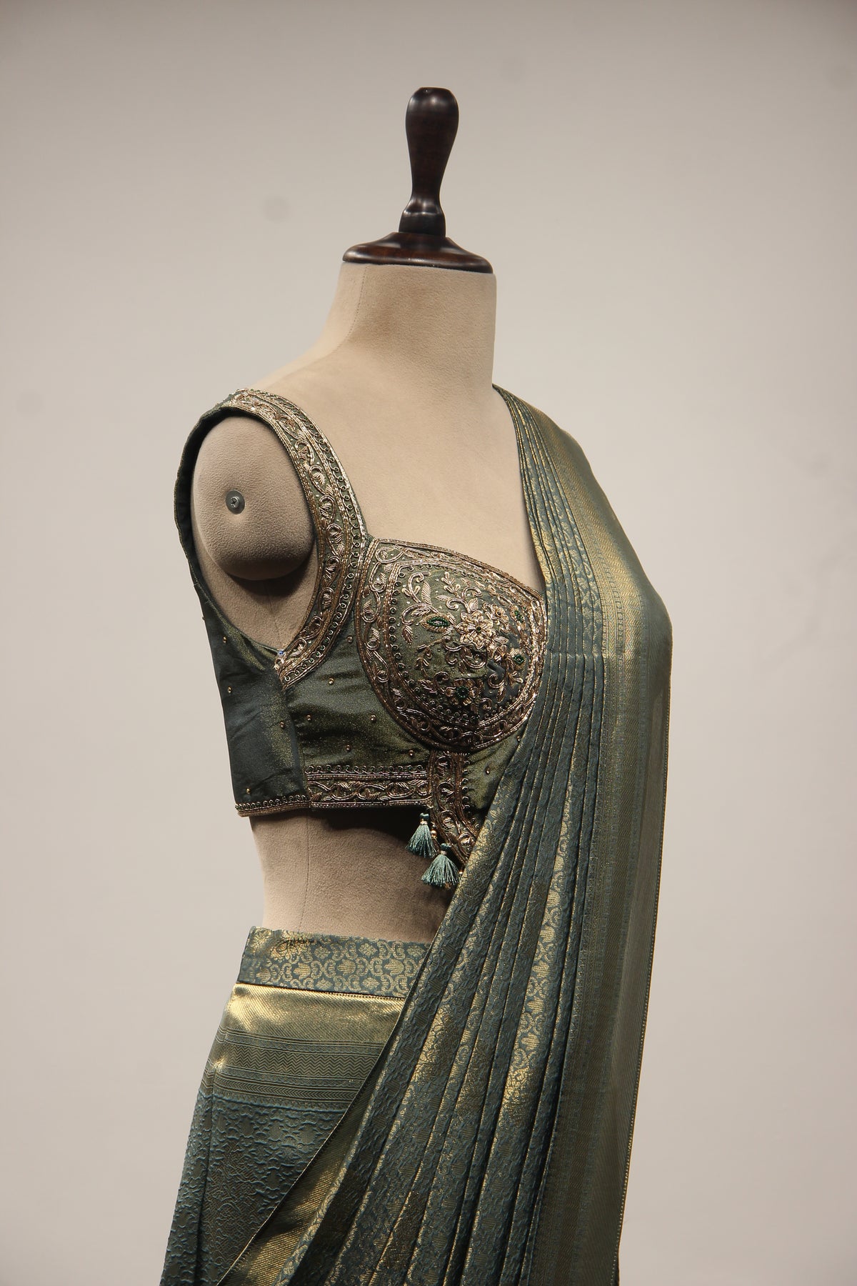 Banarasi Brocade Drape Saree with Zardozi & Cut Dana Handwork Corset in Green – side close-up