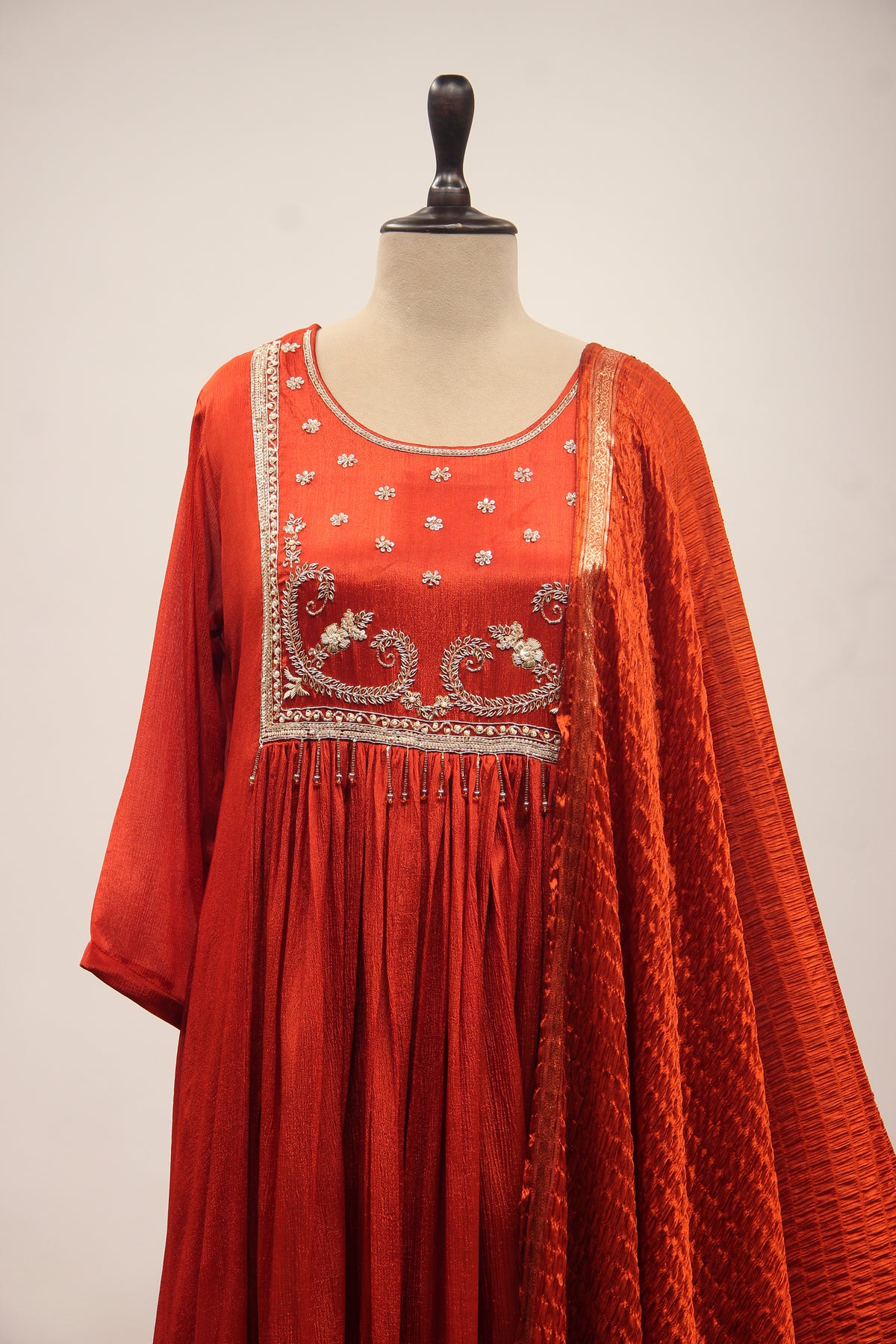 Crepe Short Anarkali Pant Suit with Cut Dana & Sequin Handwork Yoke in Orange – front close-up