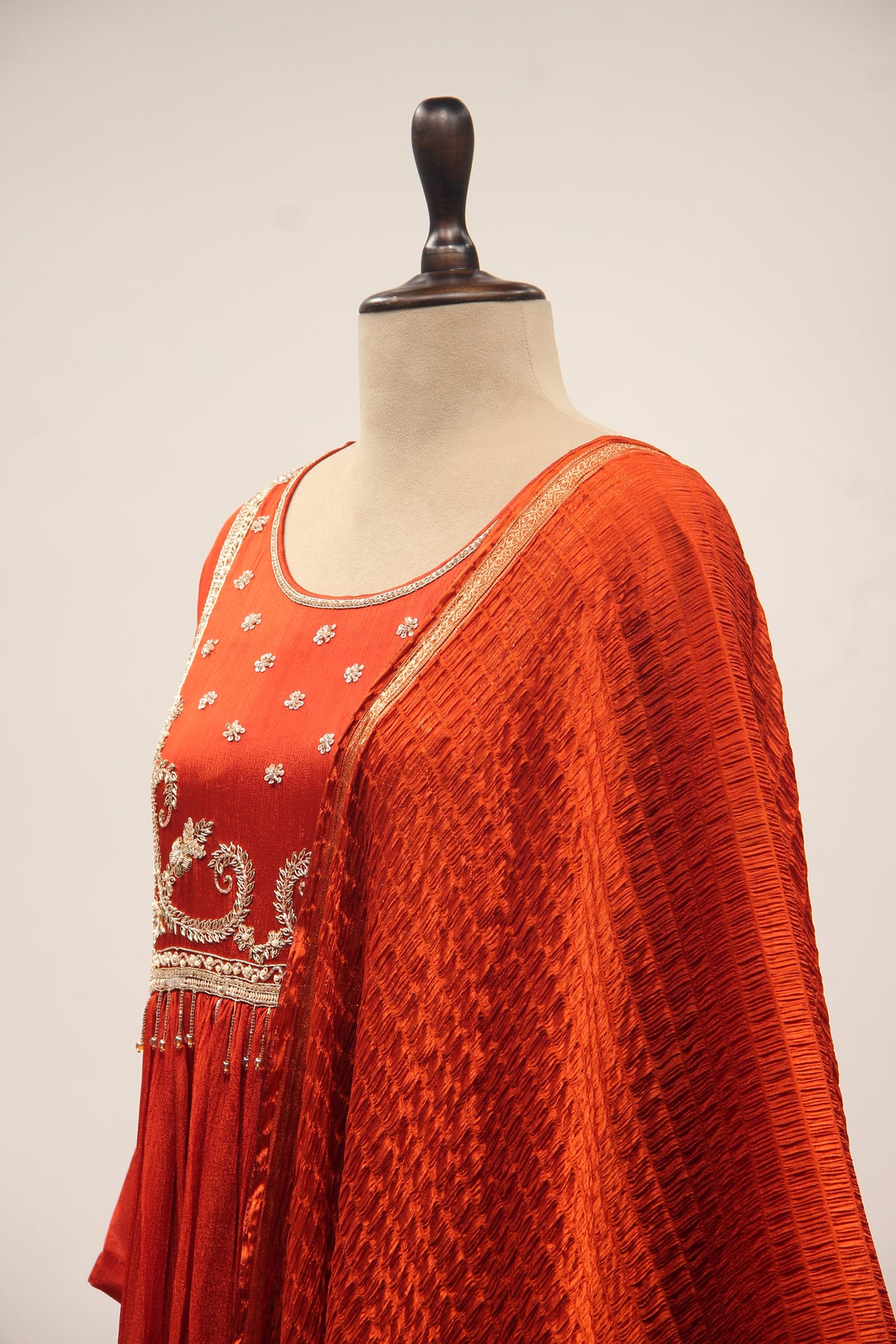 Crepe Short Anarkali Pant Suit with Cut Dana & Sequin Handwork Yoke in Orange – side close-up