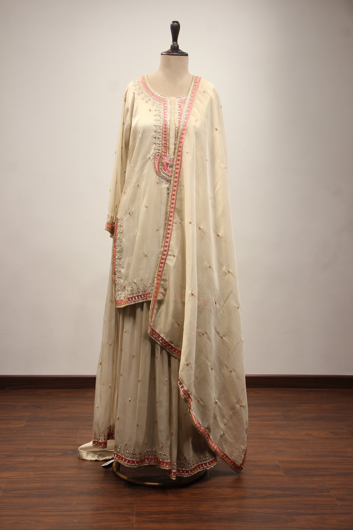 Cream Tissue Sharara Suit with Zari & Zardozi Handwork and Pink Border – front view