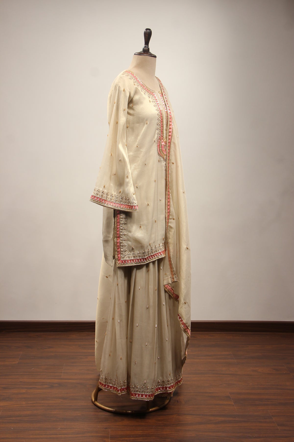Cream Tissue Sharara Suit with Zari & Zardozi Handwork and Pink Border – side view