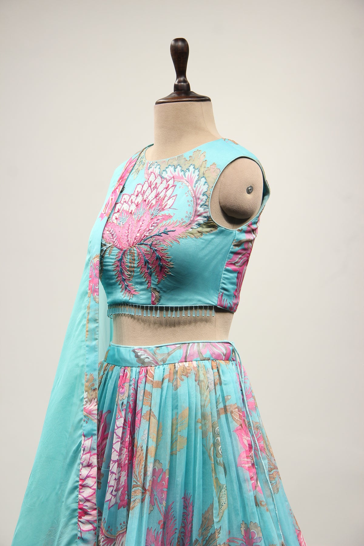 Firozi Organza Lehenga with Cut Dana & Sequin Handwork Halter Neck