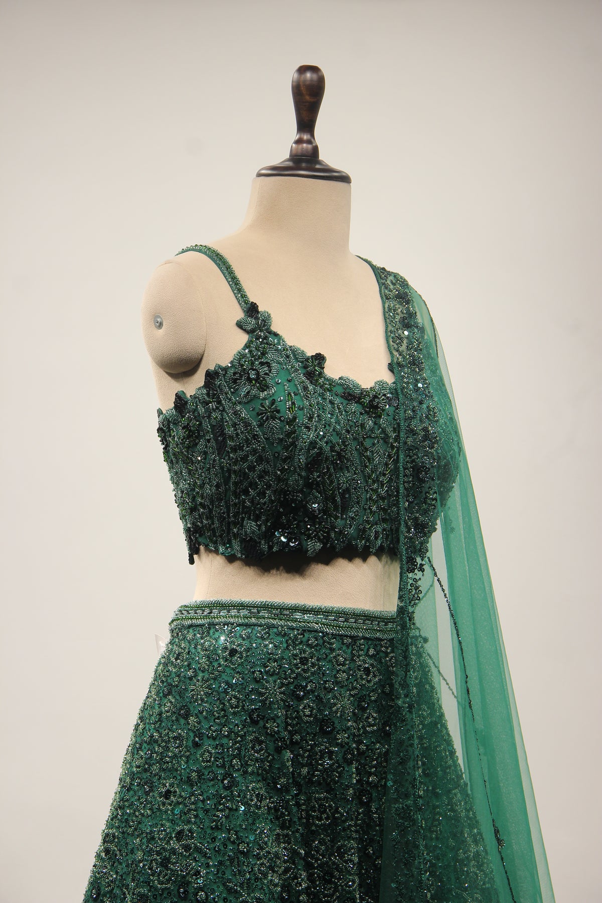 Bottle Green Net Lehenga with Cut Dana & Sequin Handwork Crop Top – side close-up
