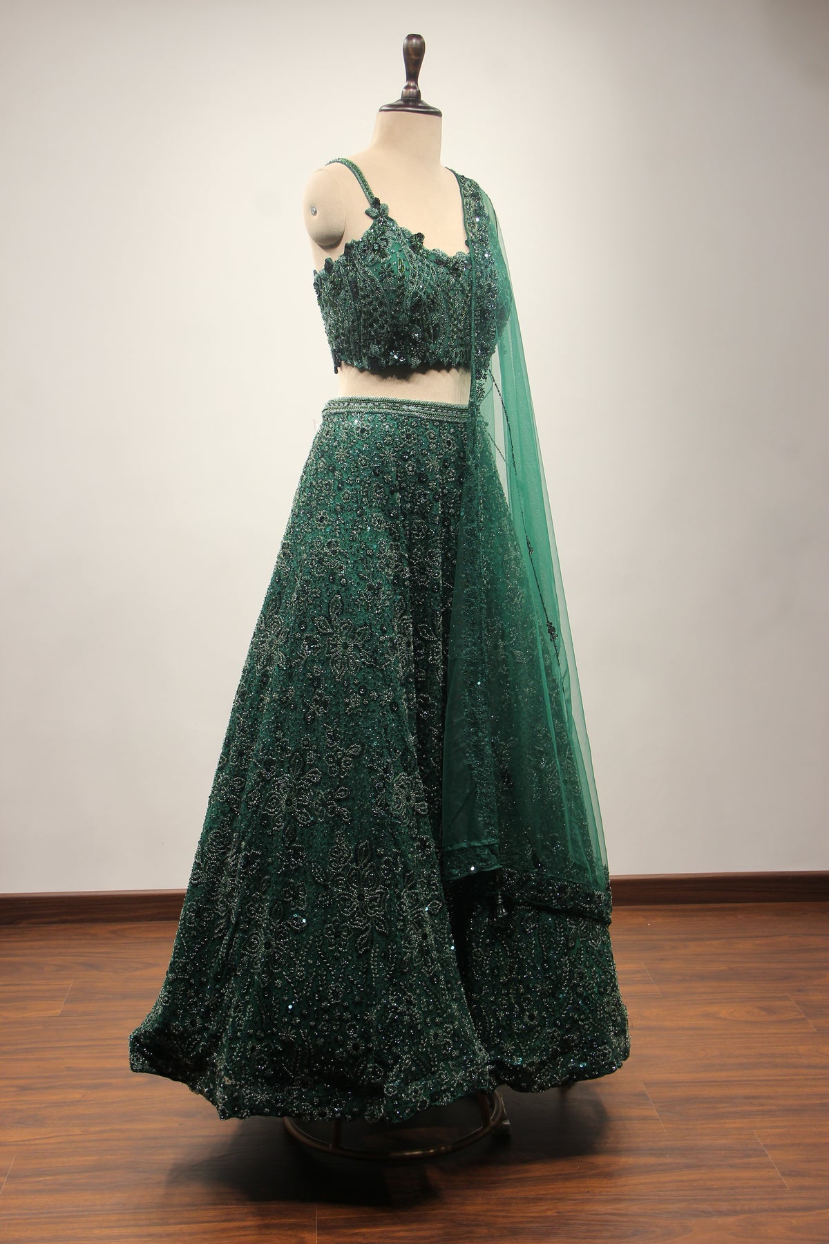 Bottle Green Net Lehenga with Cut Dana & Sequin Handwork Crop Top – side view