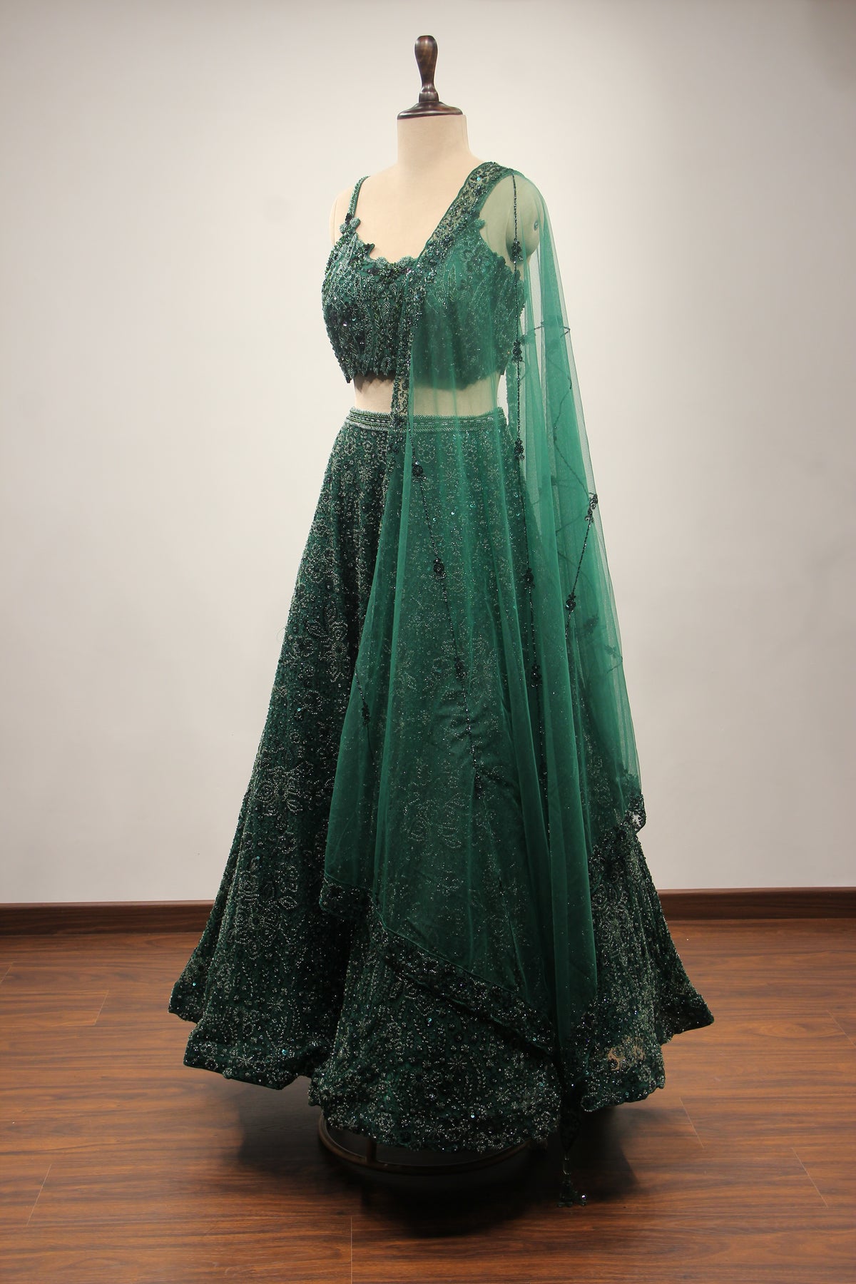 Bottle Green Net Lehenga with Cut Dana & Sequin Handwork Crop Top – other side view