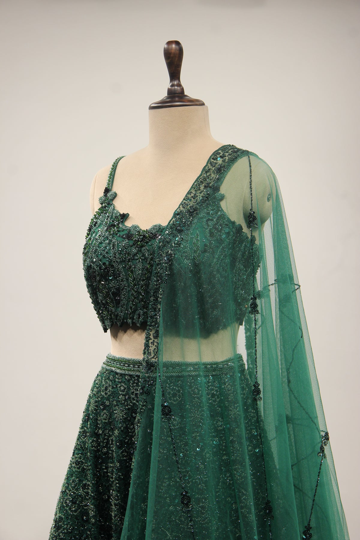 Bottle Green Net Lehenga with Cut Dana & Sequin Handwork Crop Top – other side close-up