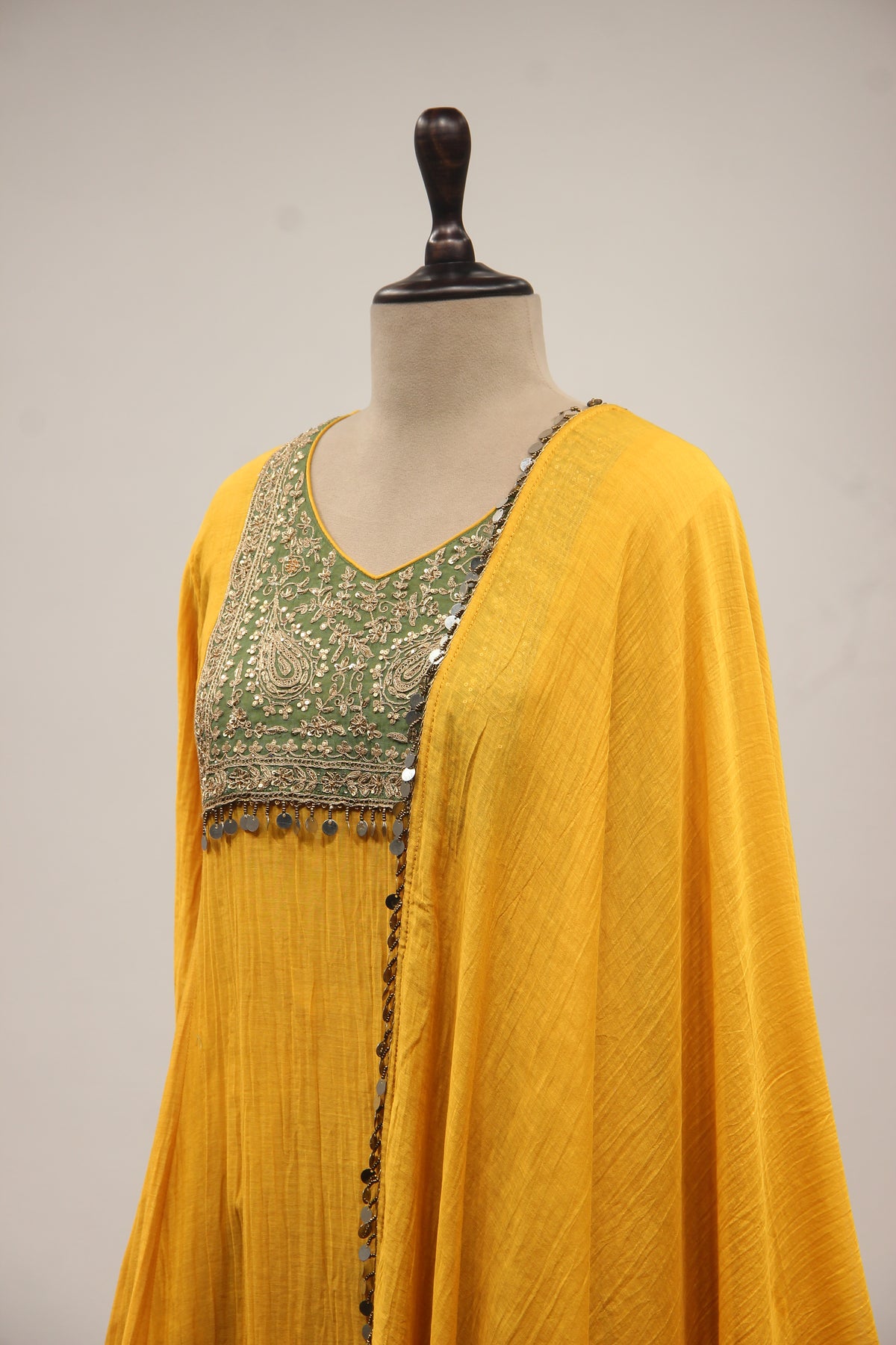 Yellow Chanderi Peplum Suit with Zari & Zardozi Handwork Farshi Salwar – side close-up
