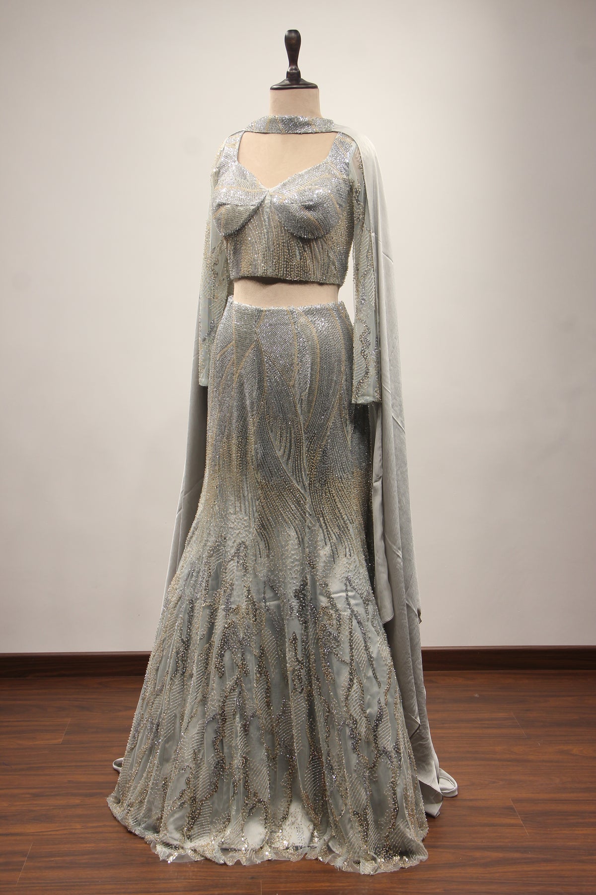 Grey Net Mermaid Lehenga with Cut Dana & Sequin Handwork Bustier – side view
