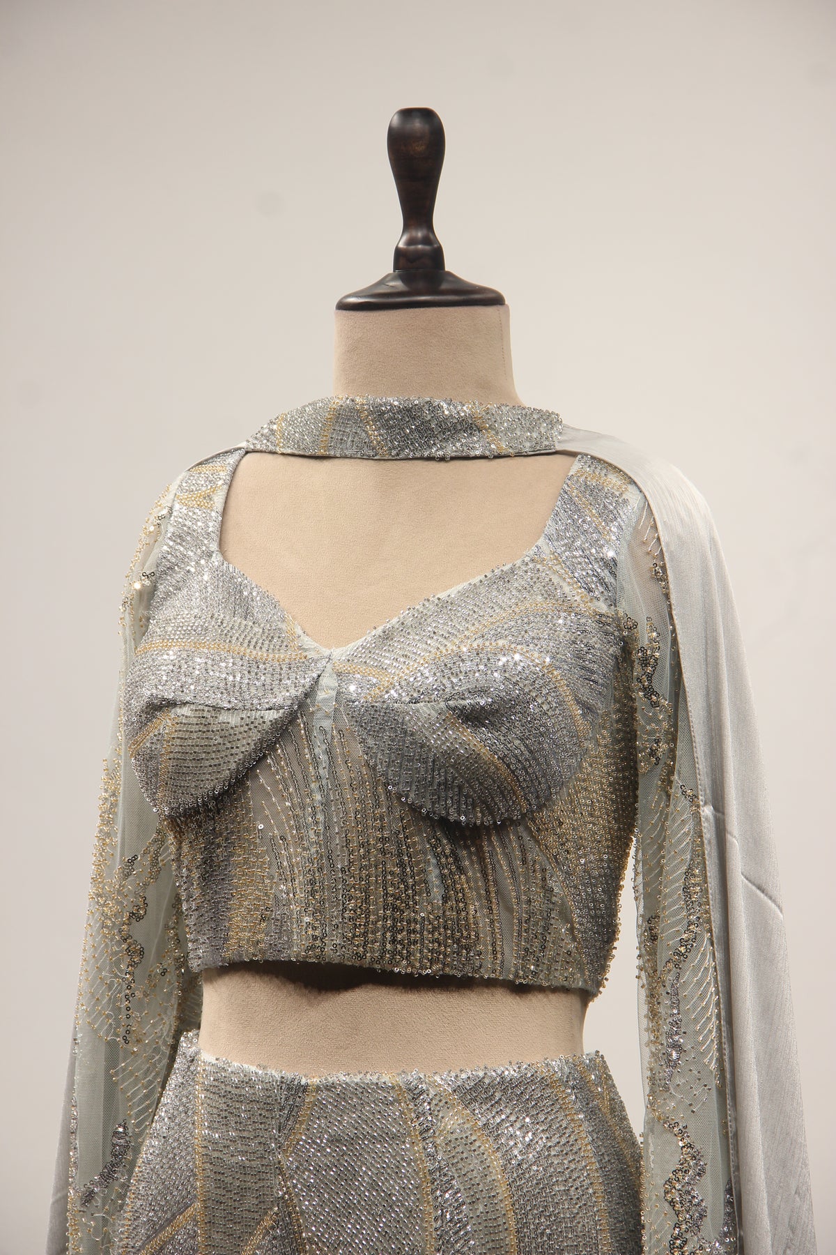 Grey Net Mermaid Lehenga with Cut Dana & Sequin Handwork Bustier – side close-up