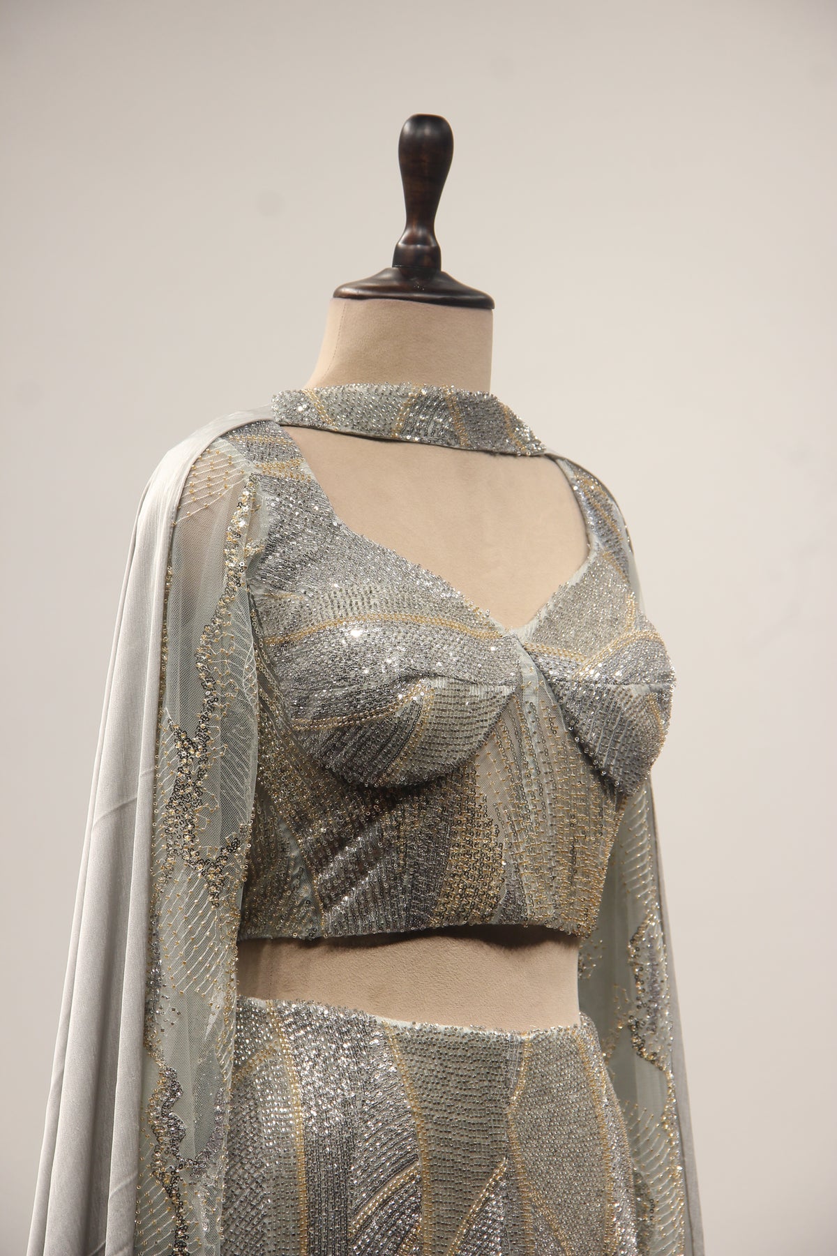 Grey Net Mermaid Lehenga with Cut Dana & Sequin Handwork Bustier – other side close-up