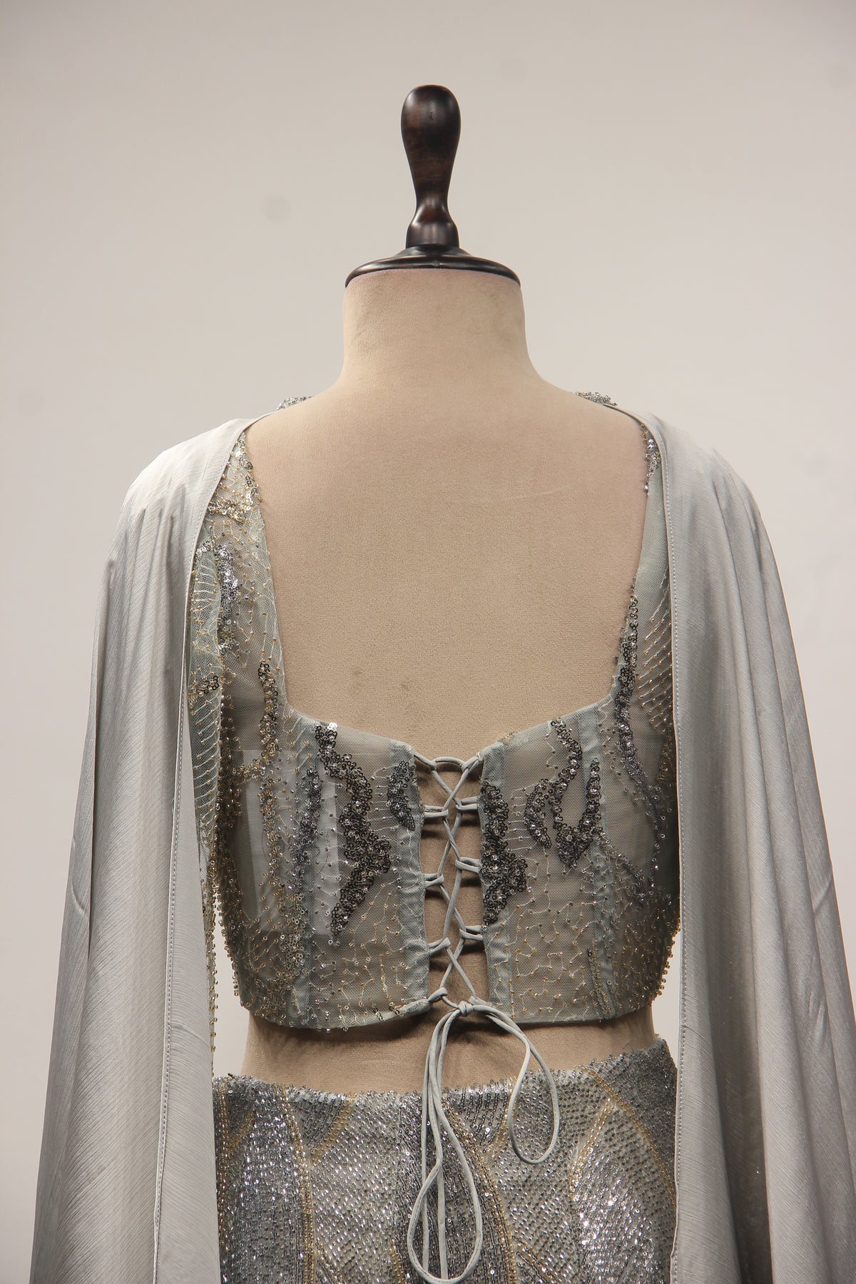 Grey Net Mermaid Lehenga with Cut Dana & Sequin Handwork Bustier – back close-up
