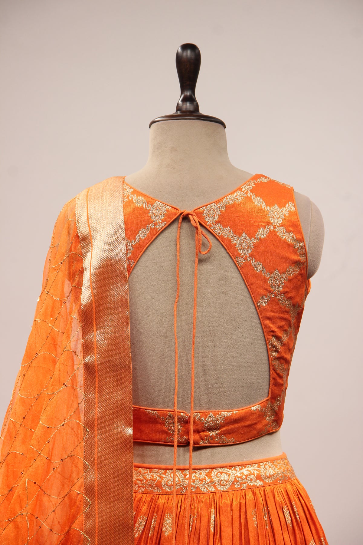 Orange Banarsi Brocade Lehenga with Woven Handwork Halter Neck