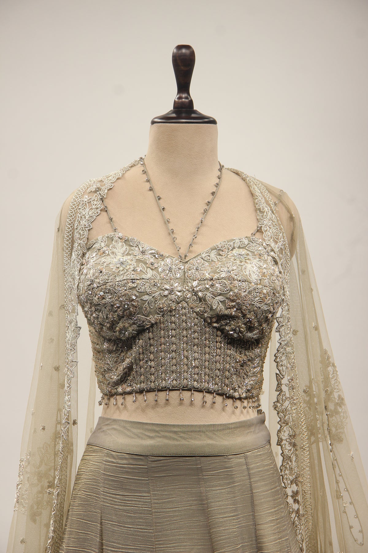 Grey Tissue Corset Lehenga with Sequin & Stone Handwork and Net Shrug – front close-up, with shrug