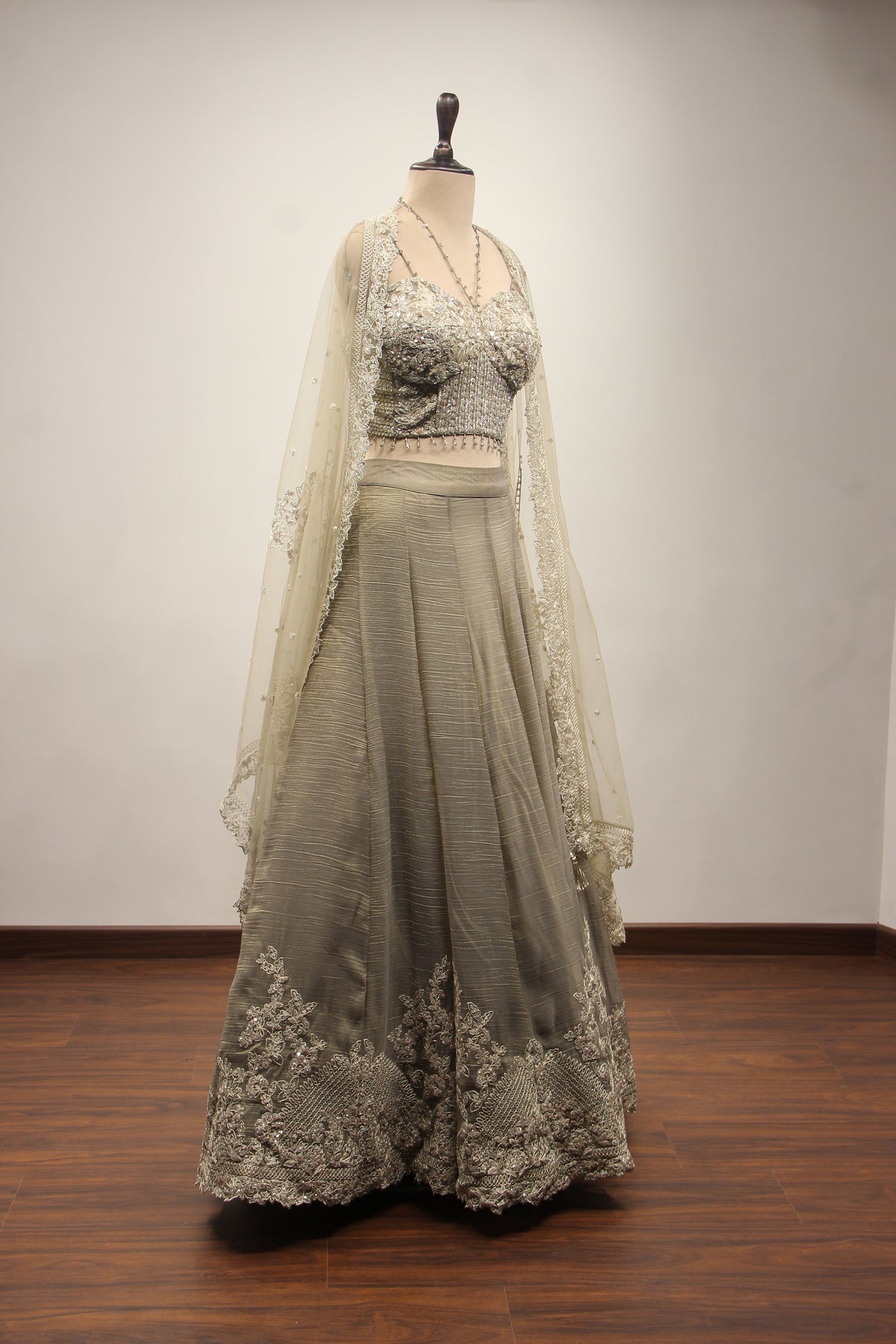 Grey Tissue Corset Lehenga with Sequin & Stone Handwork and Net Shrug – other side view, with shrug