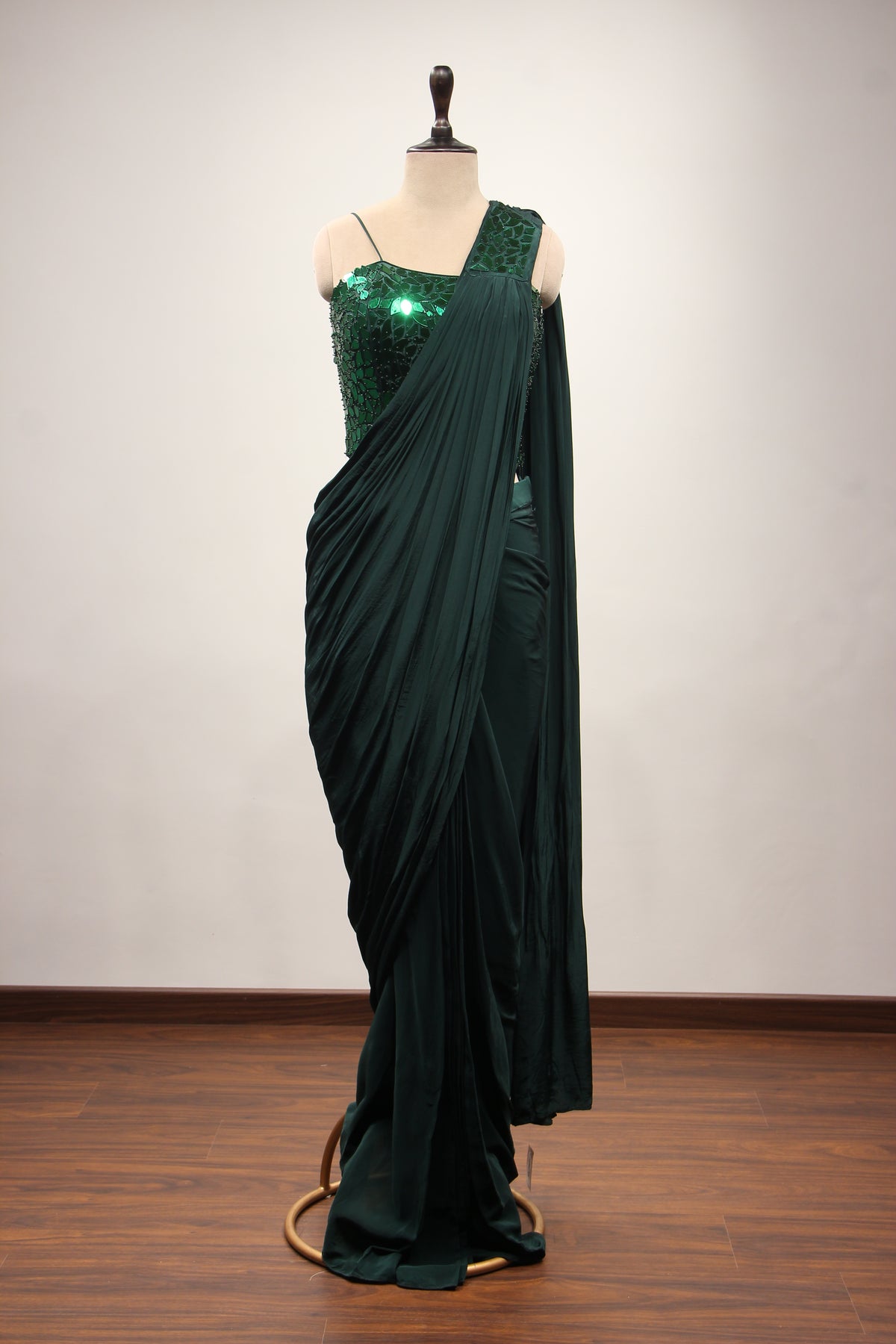 Bottle Green Crepe Drape Saree with Mirror & Bead Handwork Corset – front view