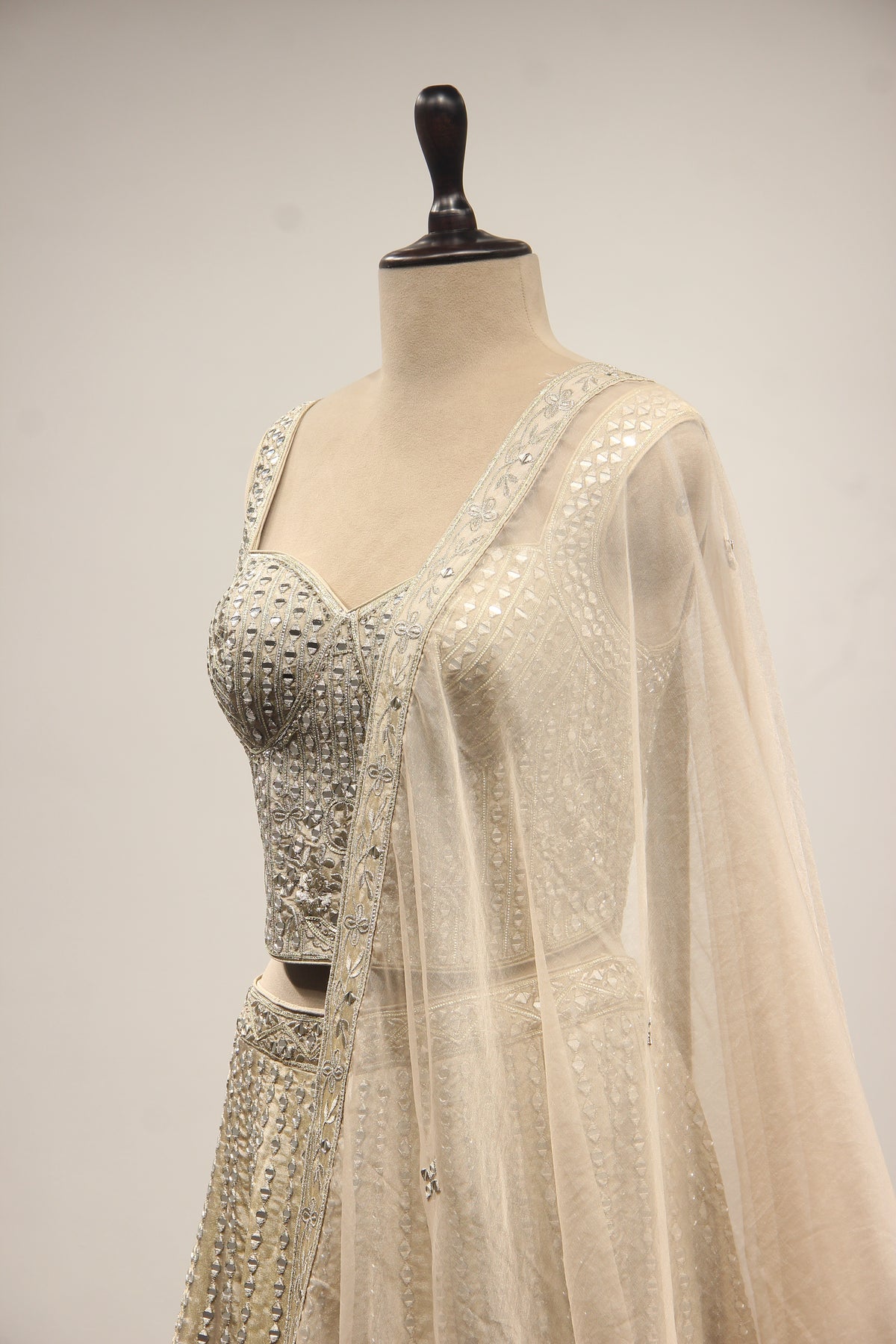 Grey Tissue Lehenga with Mirror & Zari Handwork Sweetheart Corset – side close-up