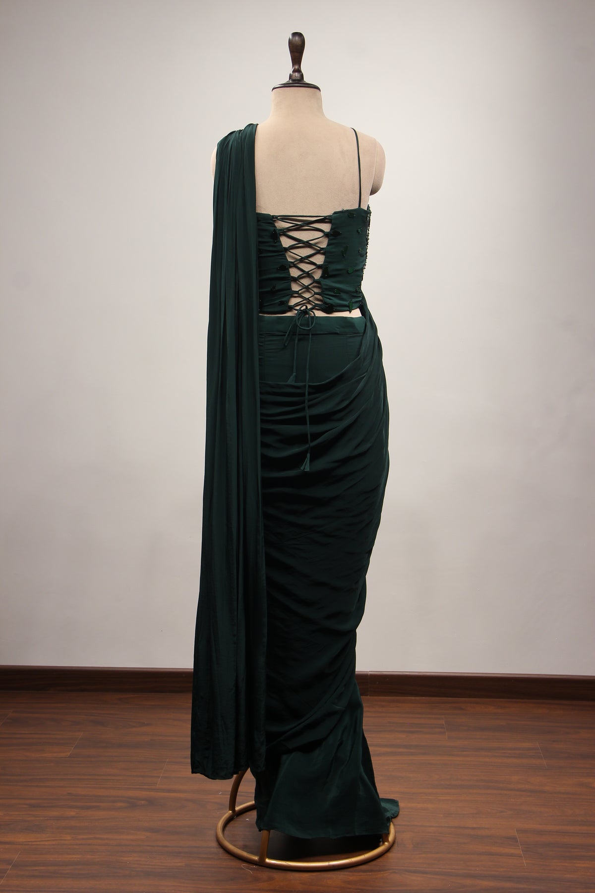 Bottle Green Crepe Drape Saree with Mirror & Bead Handwork Corset – back view