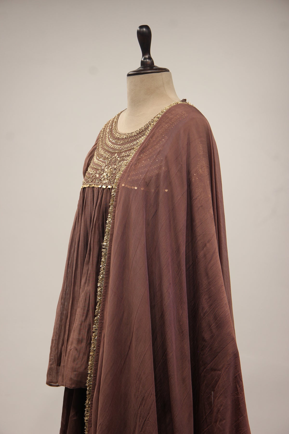Chanderi Peplum Sharara Suit with Sequin & Zari Handwork Yoke in Brown – side close-up