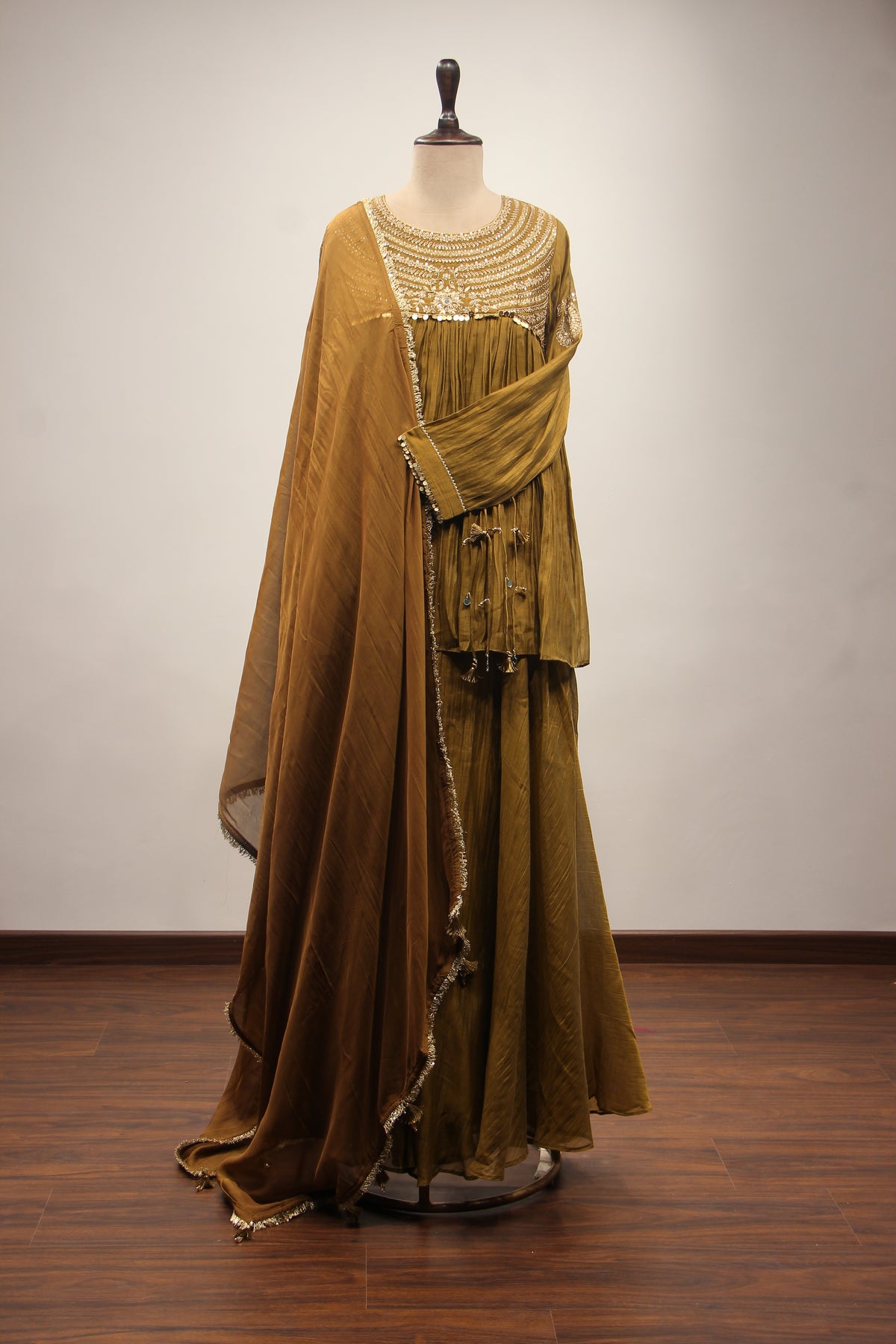 Chanderi Peplum Sharara Suit with Sequin & Zari Handwork Yoke in Green – front view