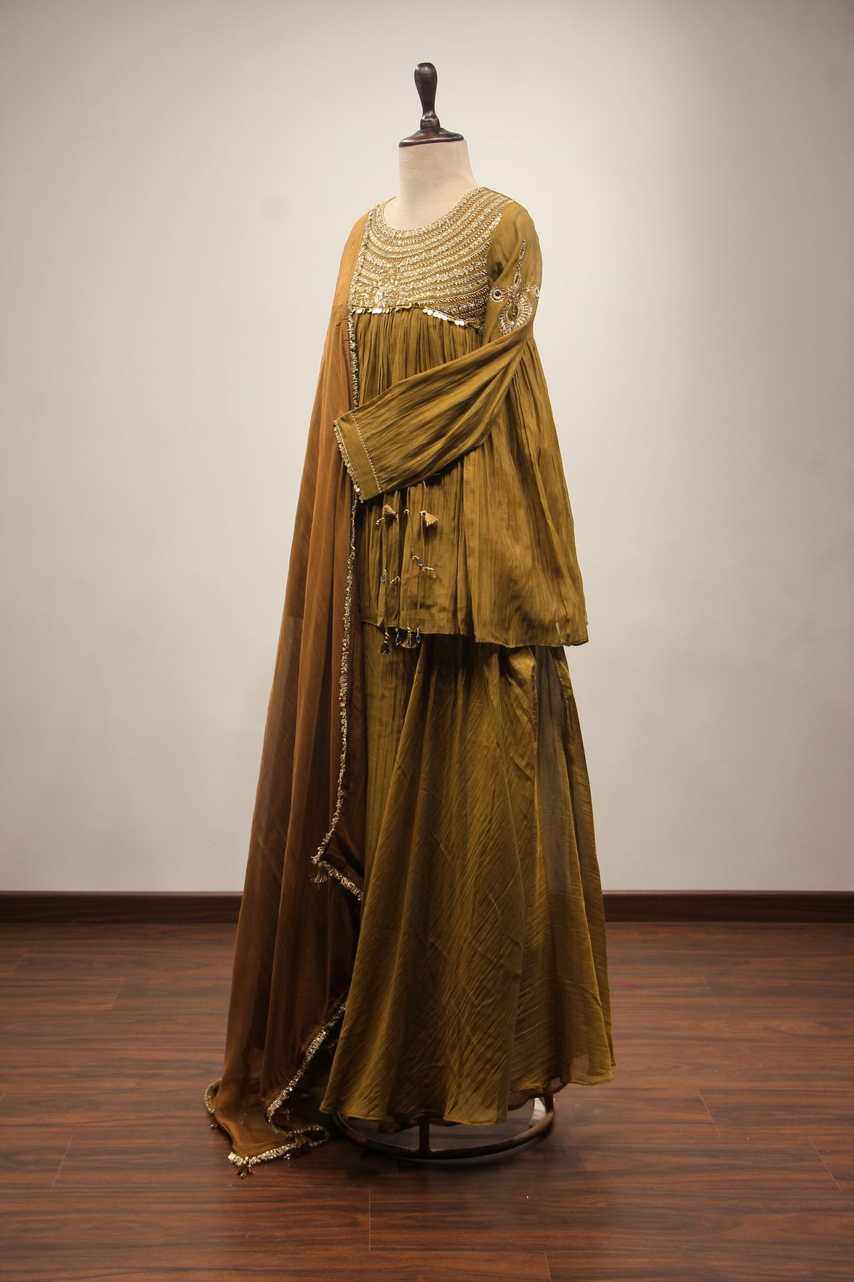 Chanderi Peplum Sharara Suit with Sequin & Zari Handwork Yoke in Green – other side view
