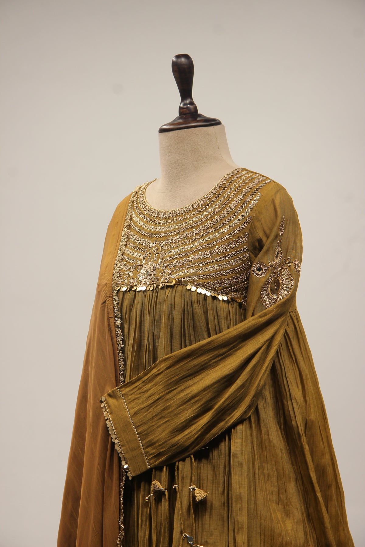 Chanderi Peplum Sharara Suit with Sequin & Zari Handwork Yoke in Green – other side close-up