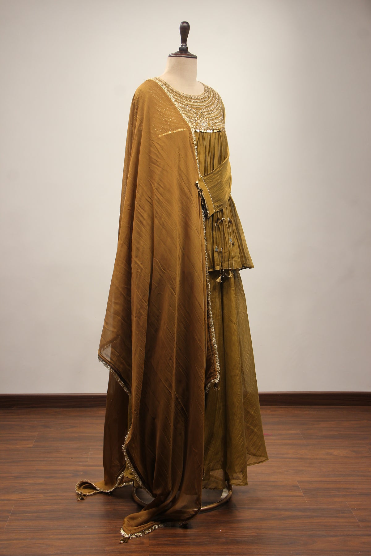 Chanderi Peplum Sharara Suit with Sequin & Zari Handwork Yoke in Green – side view