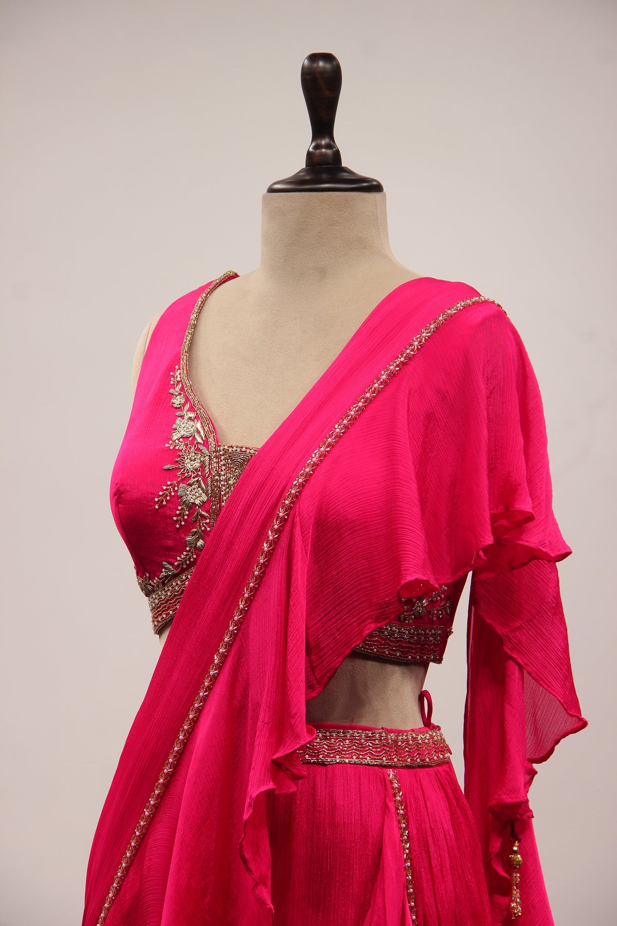 Crepe Ruffle Drape Saree with Zardozi & Bead Handwork V-Neck Crop Top in Pink – side close-up