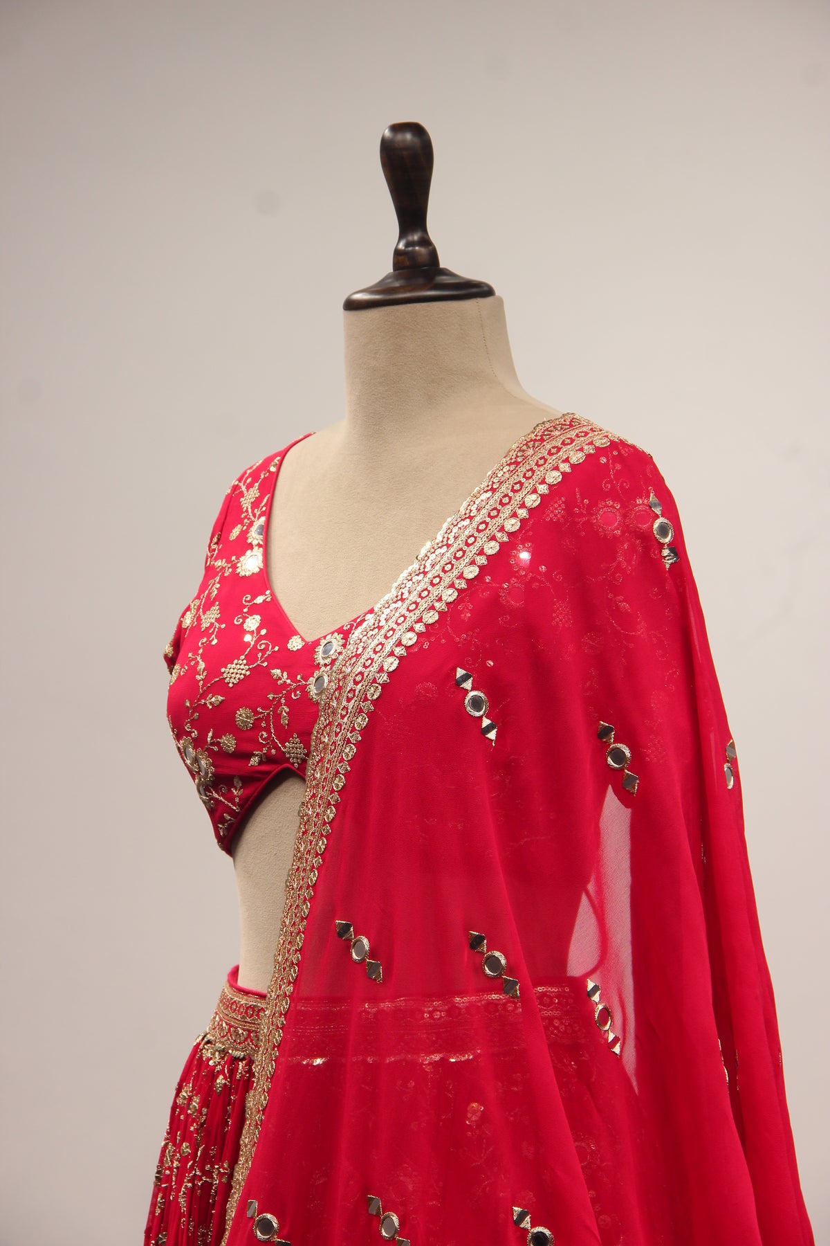 Georgette Lehenga with Mirror & Sequin Handwork Twist Front Crop Top in Red – side close-up