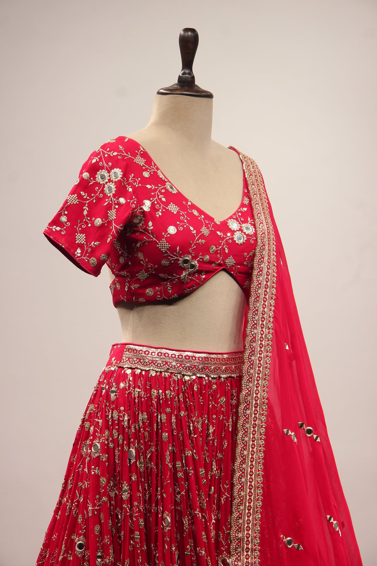 Georgette Lehenga with Mirror & Sequin Handwork Twist Front Crop Top in Red – other side close-up