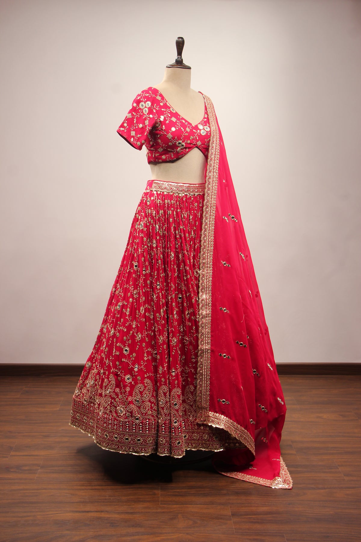 Georgette Lehenga with Mirror & Sequin Handwork Twist Front Crop Top in Red – other side view