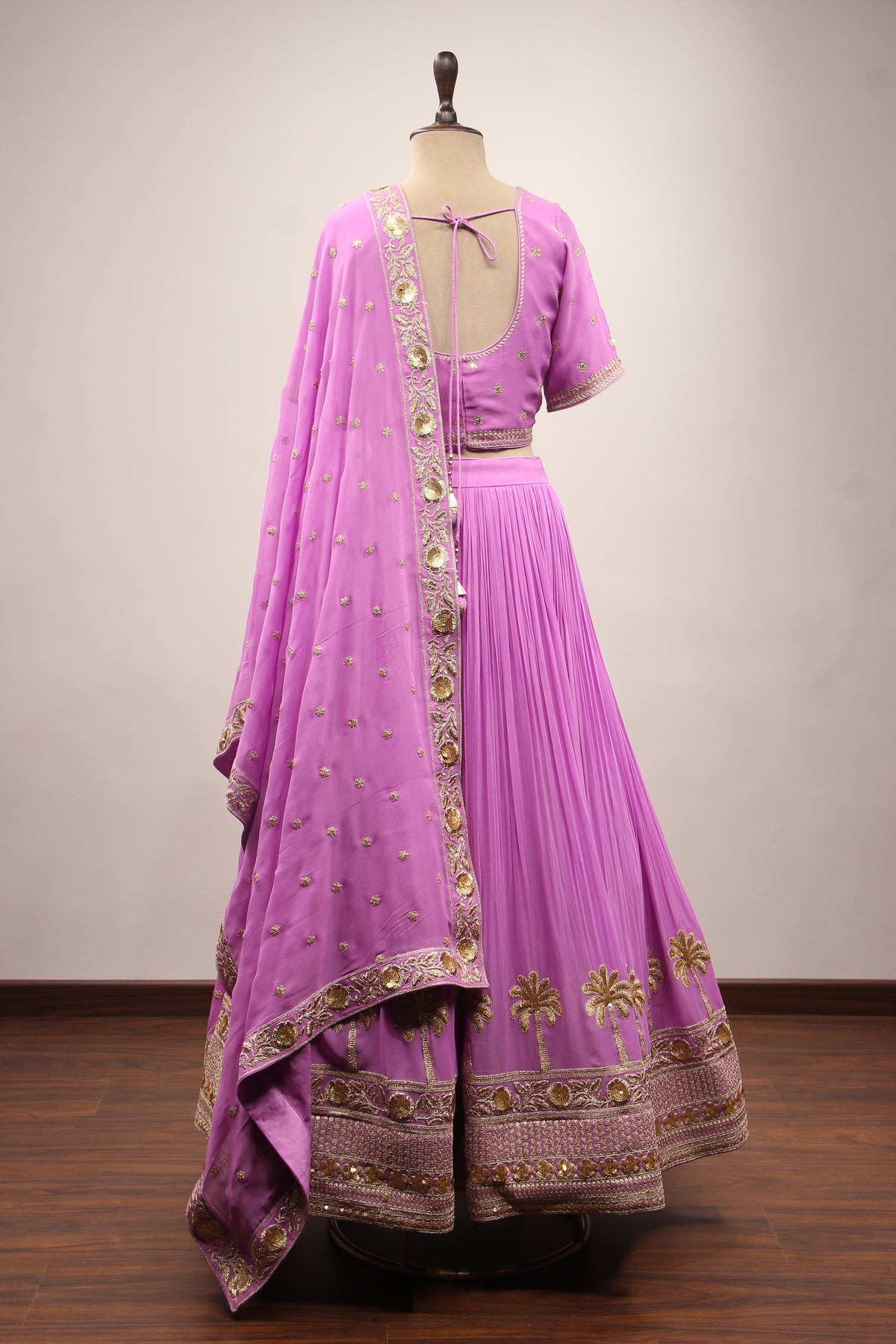 Georgette Crop Top Lehenga with Hand Embroidery & Zari Handwork in Purple – back view