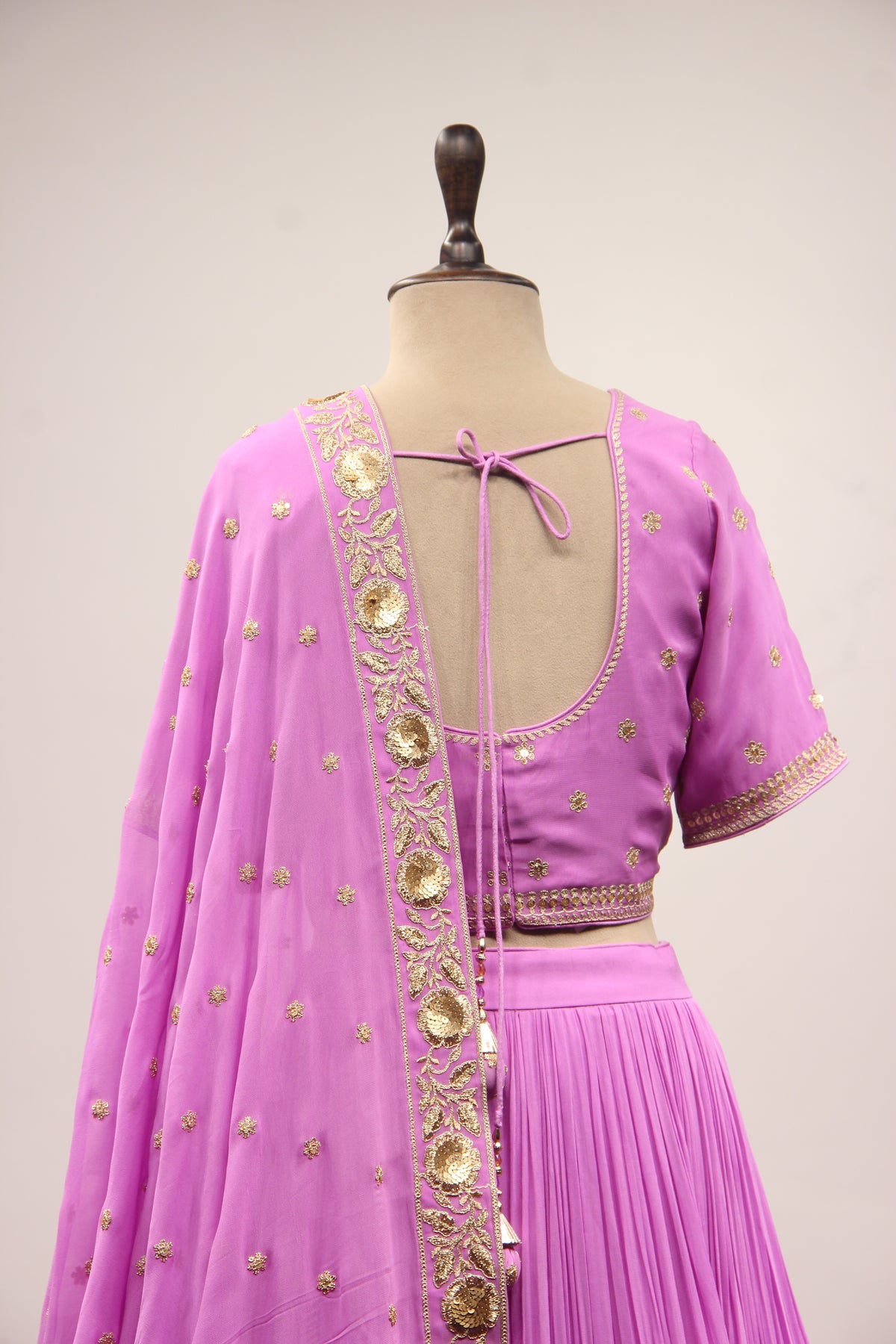 Georgette Crop Top Lehenga with Hand Embroidery & Zari Handwork in Purple – back close-up