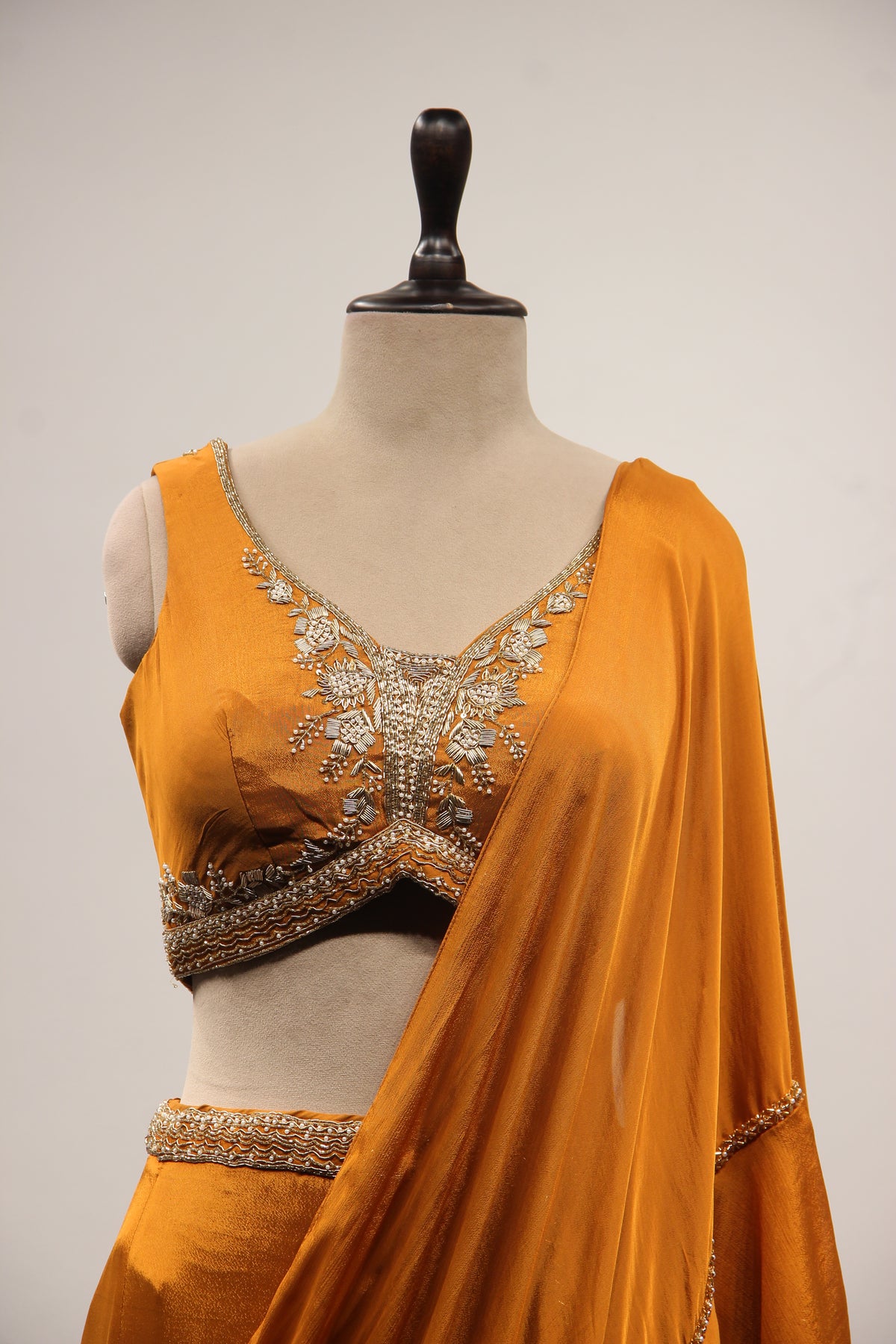 Crepe Ruffle Drape Saree with Zardozi & Bead Handwork V-Neck Crop Top in Yellow – front close-up