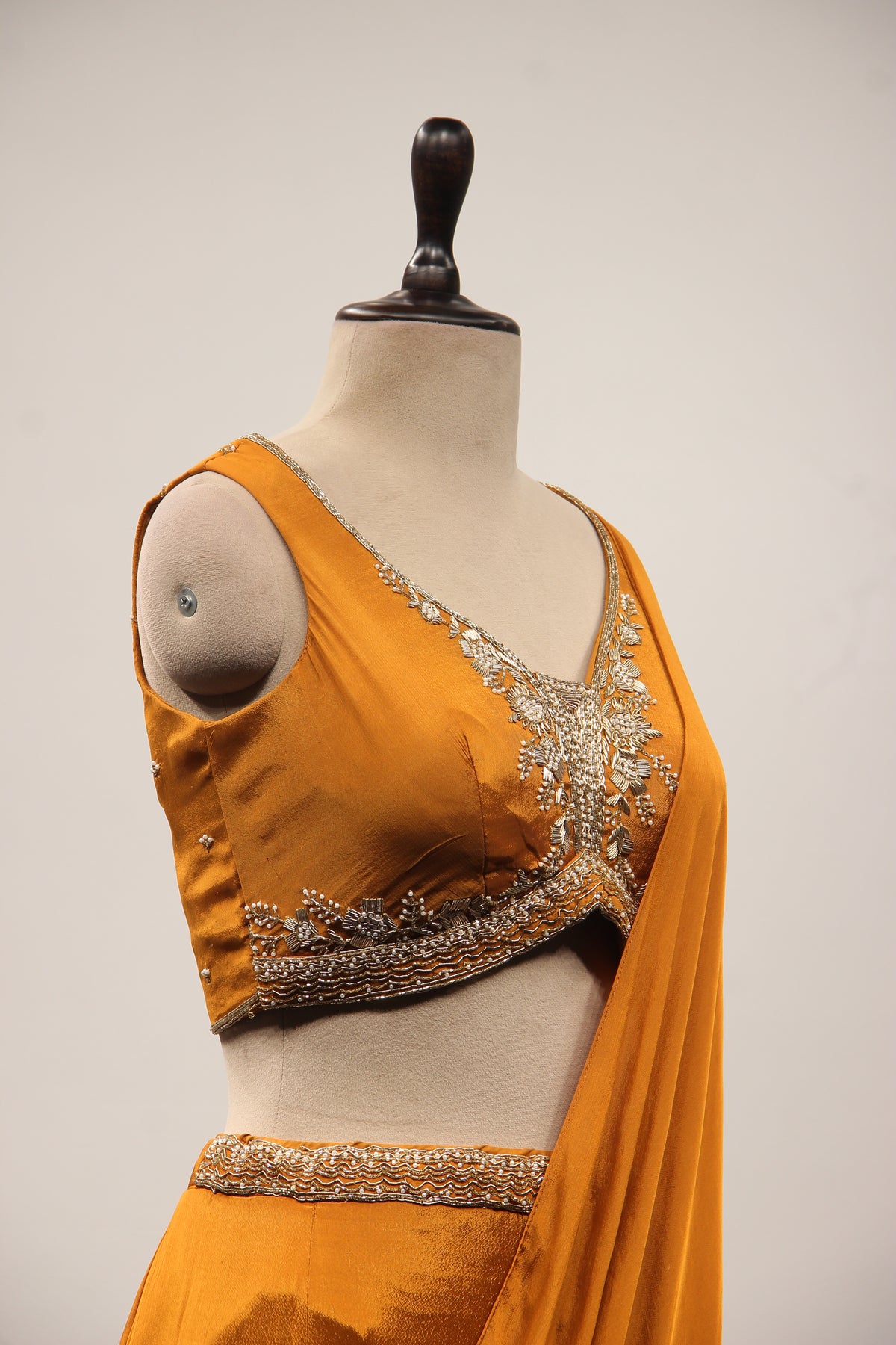 Crepe Ruffle Drape Saree with Zardozi & Bead Handwork V-Neck Crop Top in Yellow – other side close-up