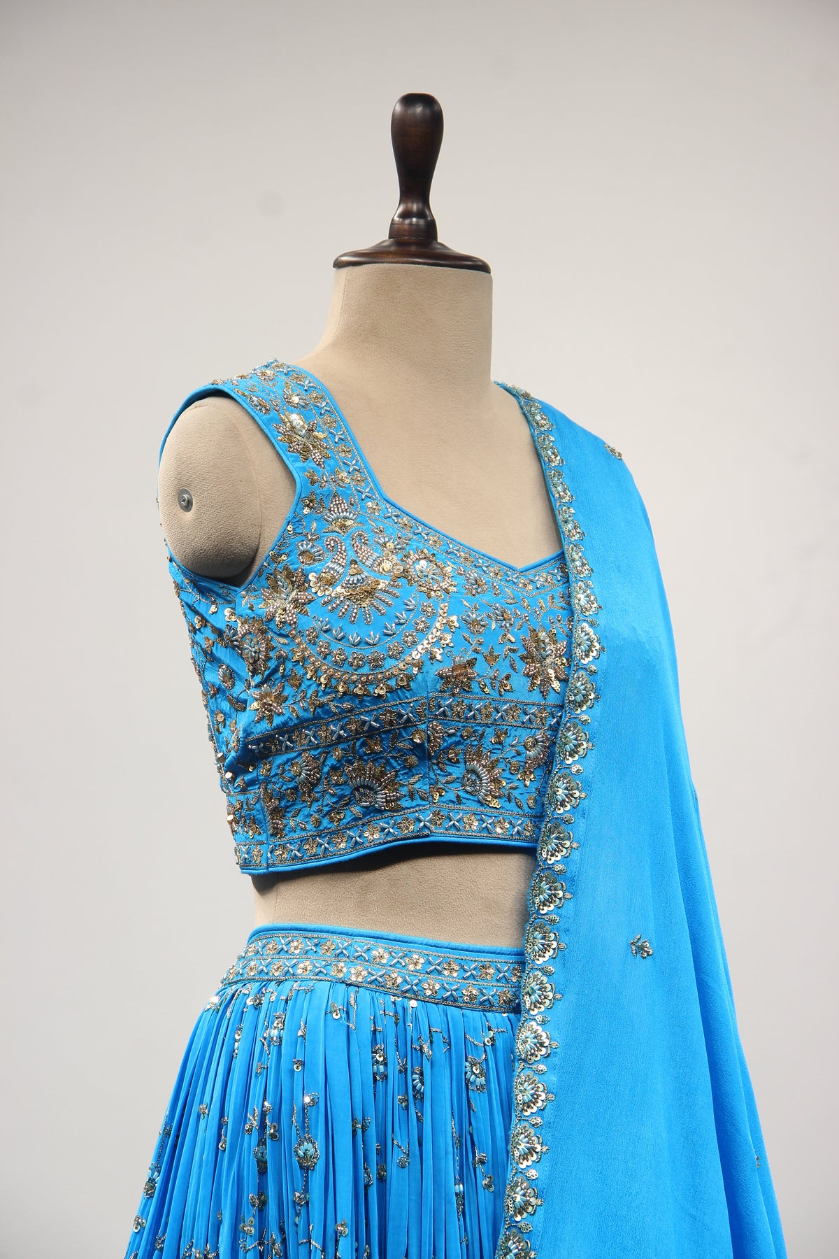 Turquoise Crepe Crop Top Lehenga in Hand Embroidery & Zardozi Handwork – side close-up
