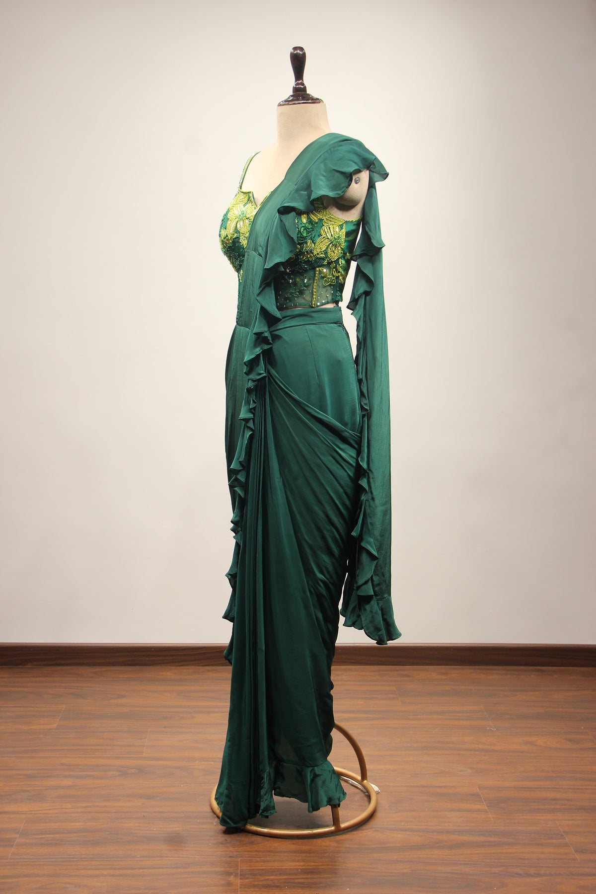 Bottle Green Crepe Drape Saree with Printed Cut Dana Handwork Corset – side view