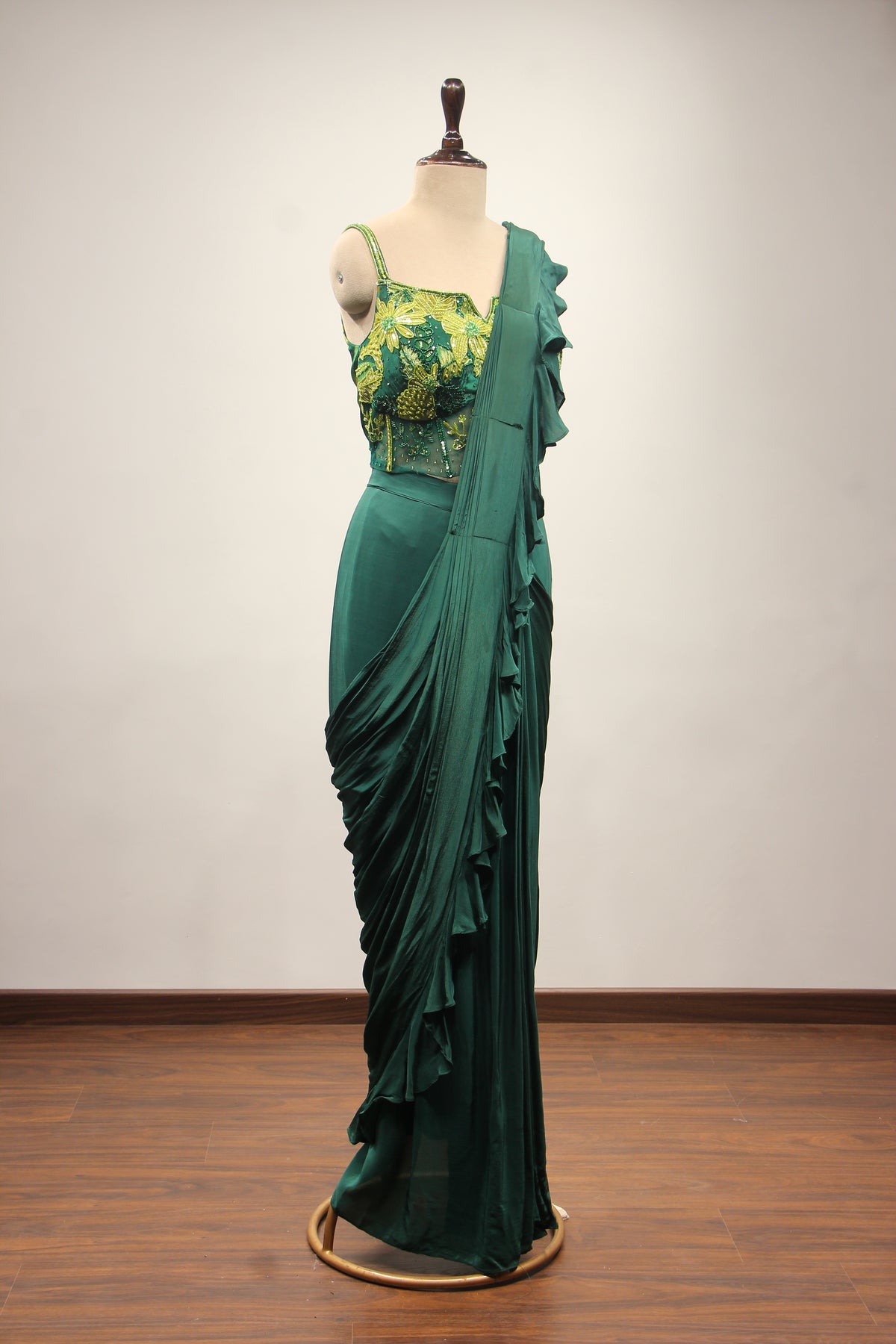 Bottle Green Crepe Drape Saree with Printed Cut Dana Handwork Corset – other side view