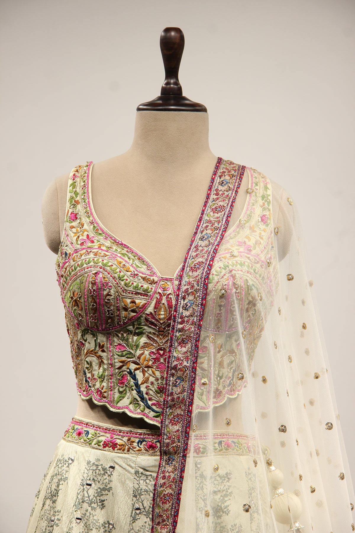 Pista Green Printed Silk Lehenga with Hand Embroidery Corset Blouse – front close-up
