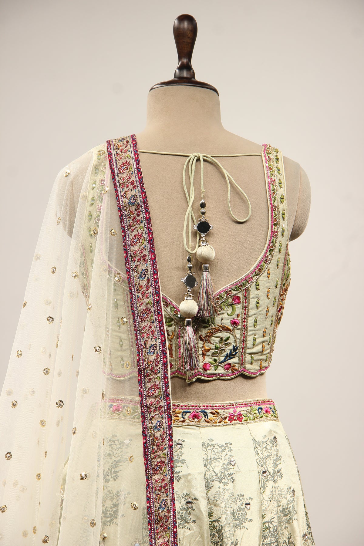 Pista Green Printed Silk Lehenga with Hand Embroidery Corset Blouse – back close-up